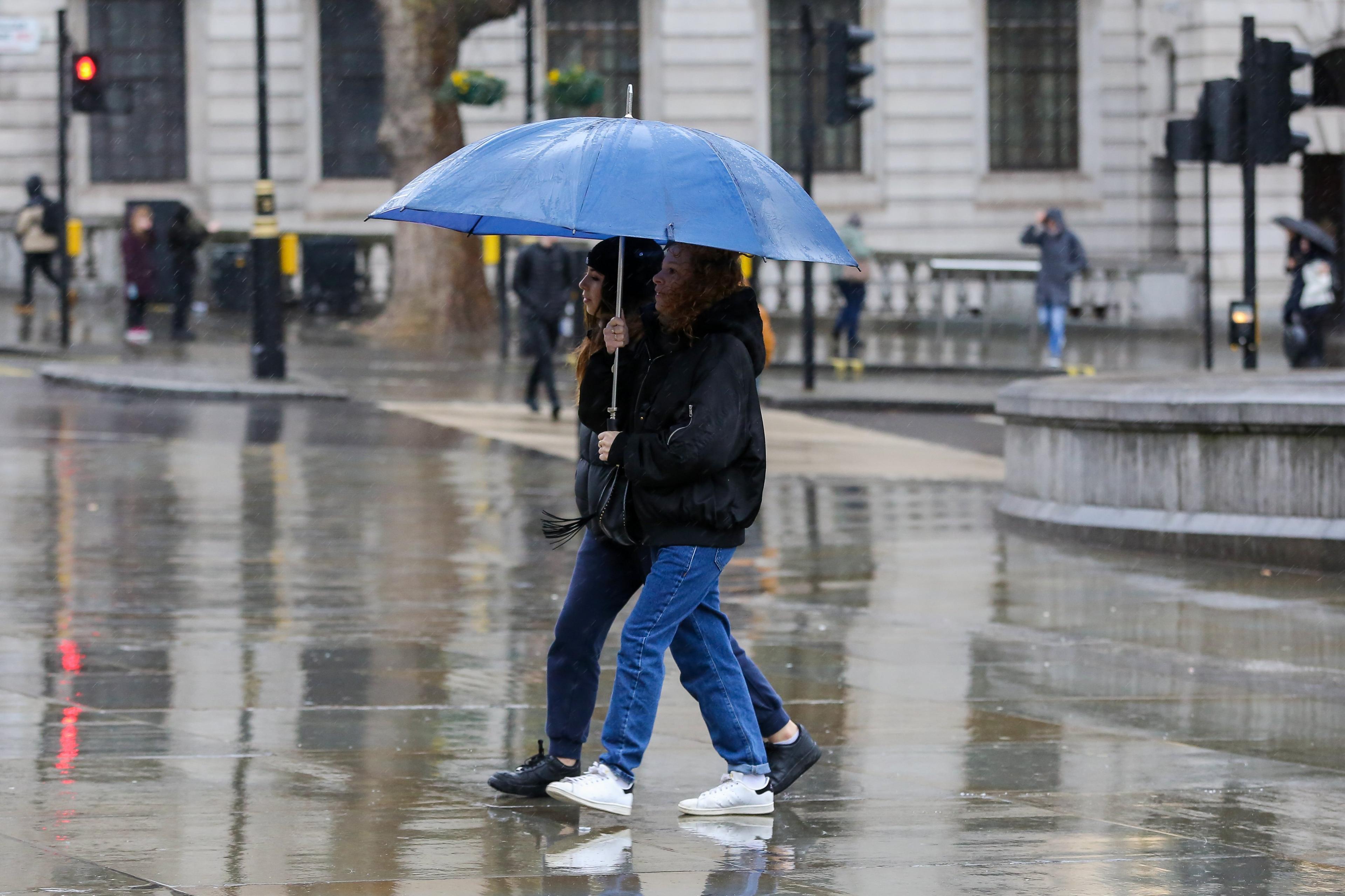 people-under-umbrella