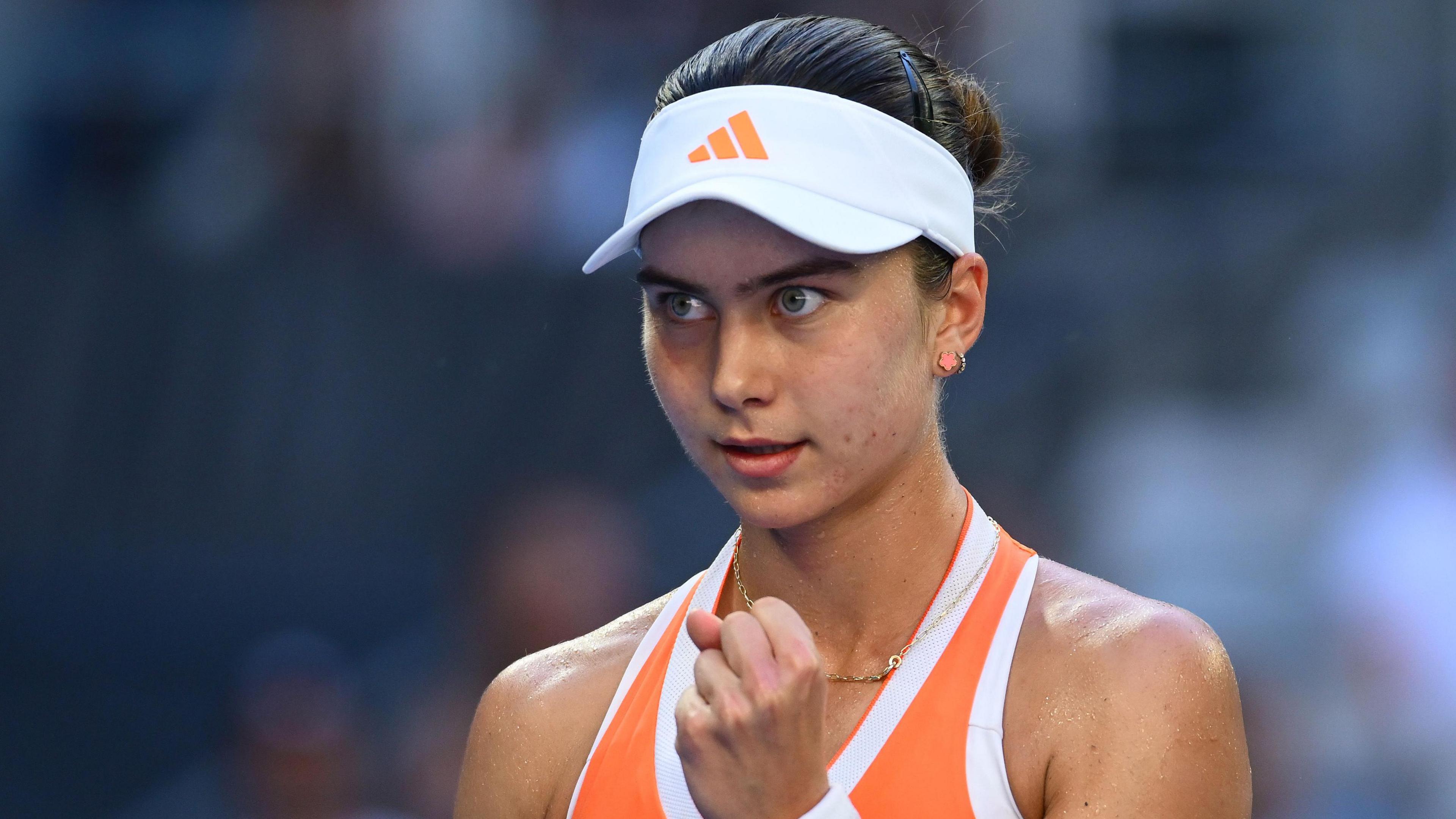 Iva Jovic clenches her fist in celebration at the Australian Open