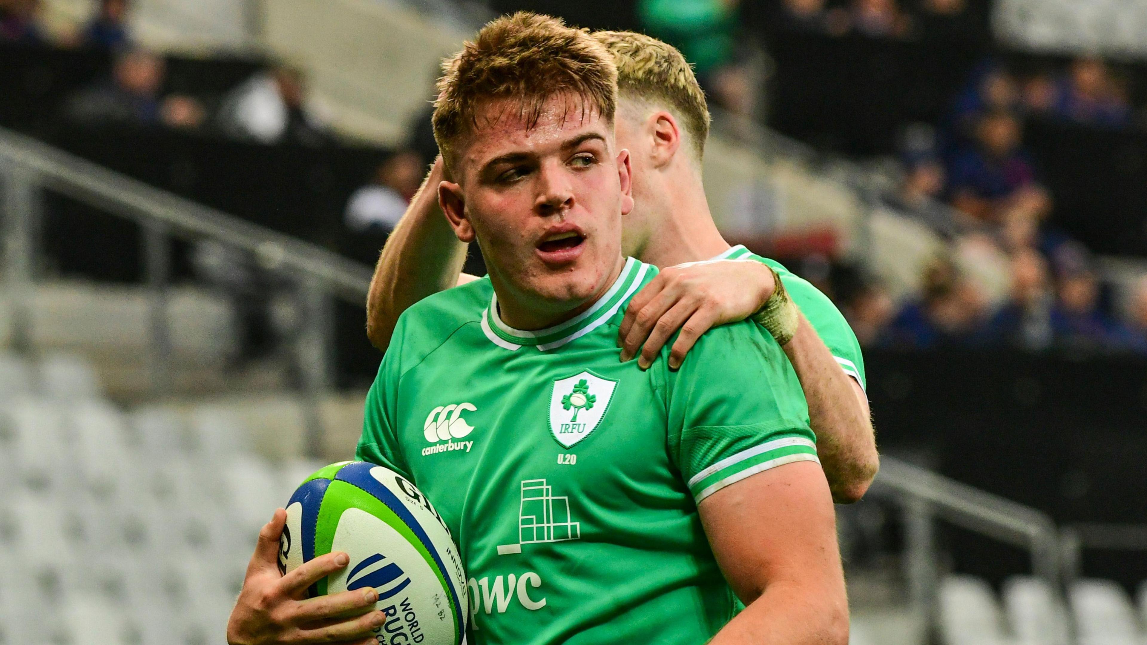 Sam Berman celebrates scoring a try