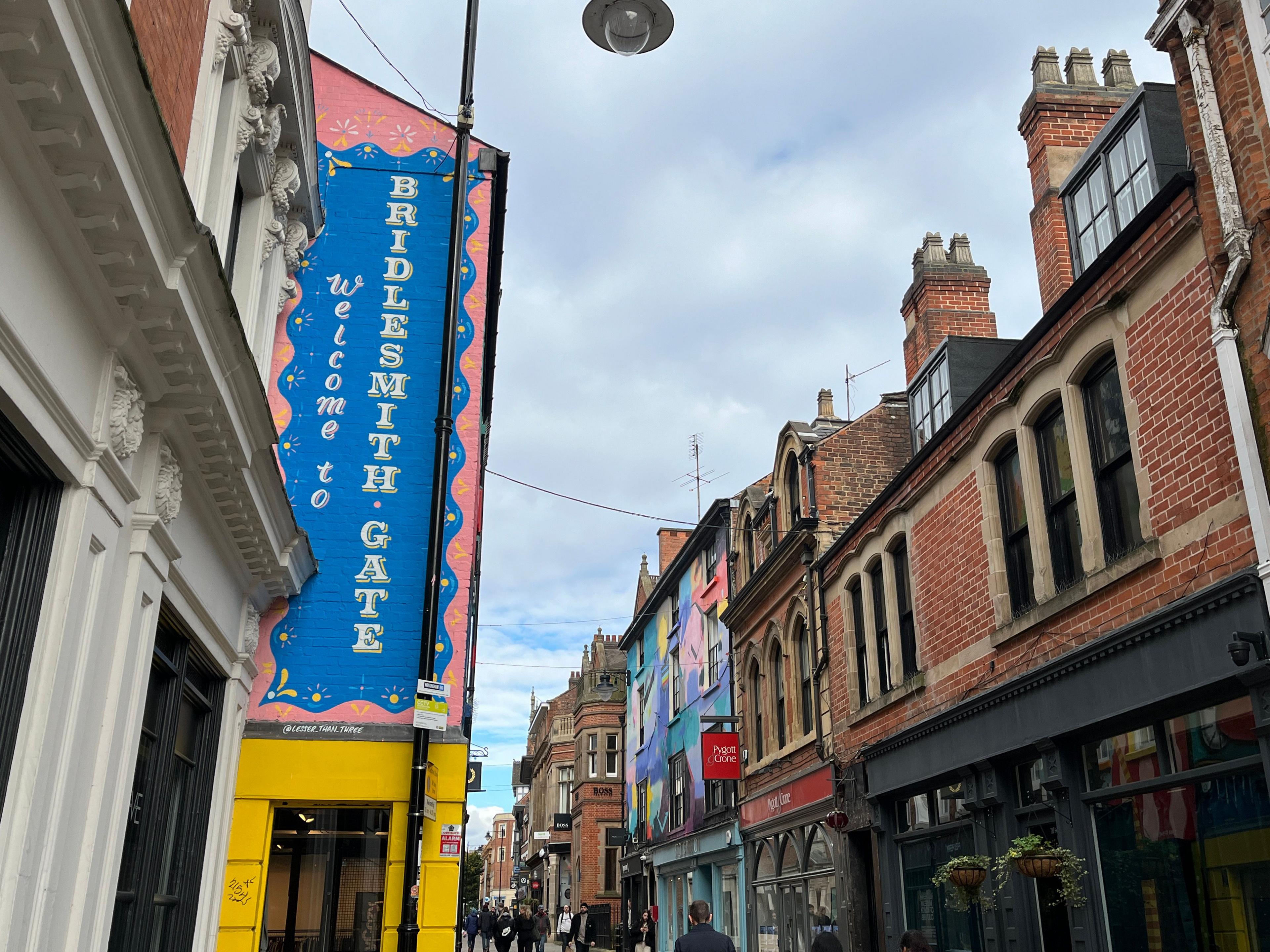 The sign on the side of a building welcoming shoppers to Bridlesmith Gate