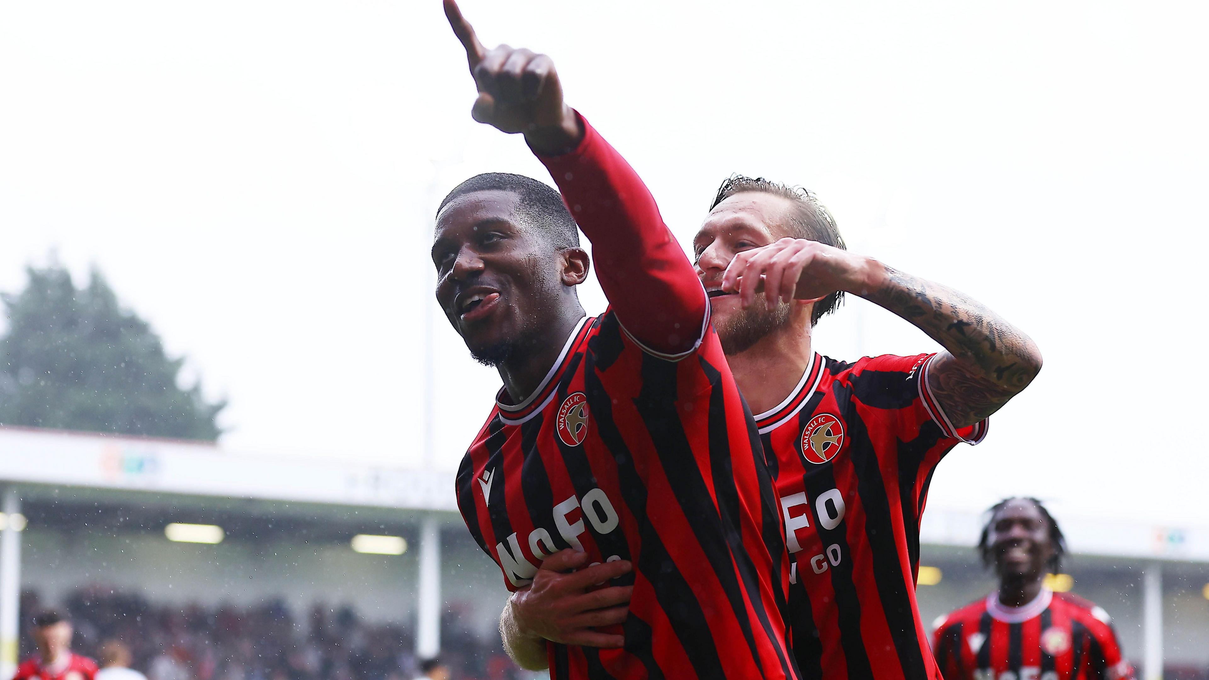 Daniel Kanu celebrates scoring for Walsall 