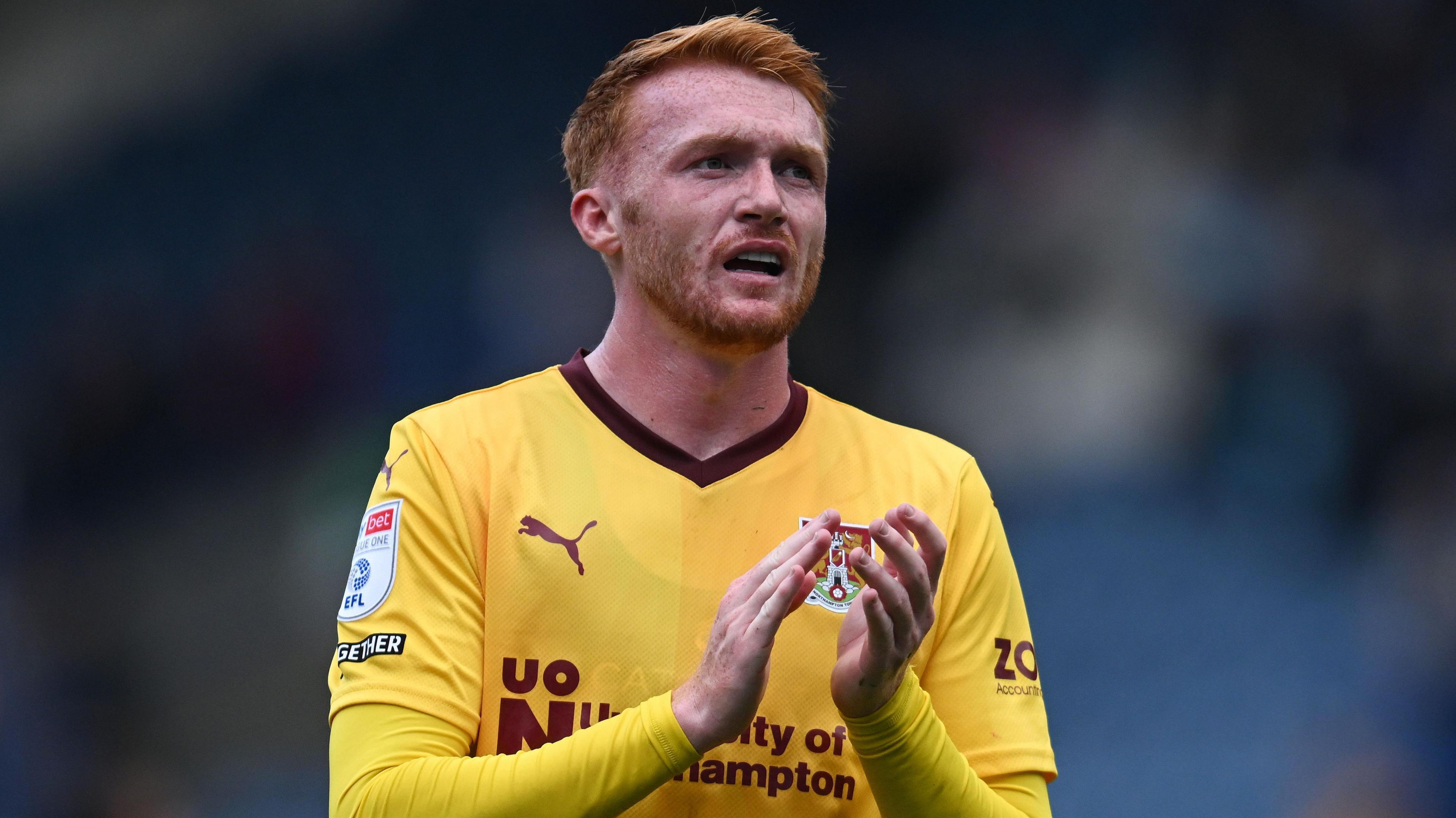 Callum Morton applauds Northampton Town fans