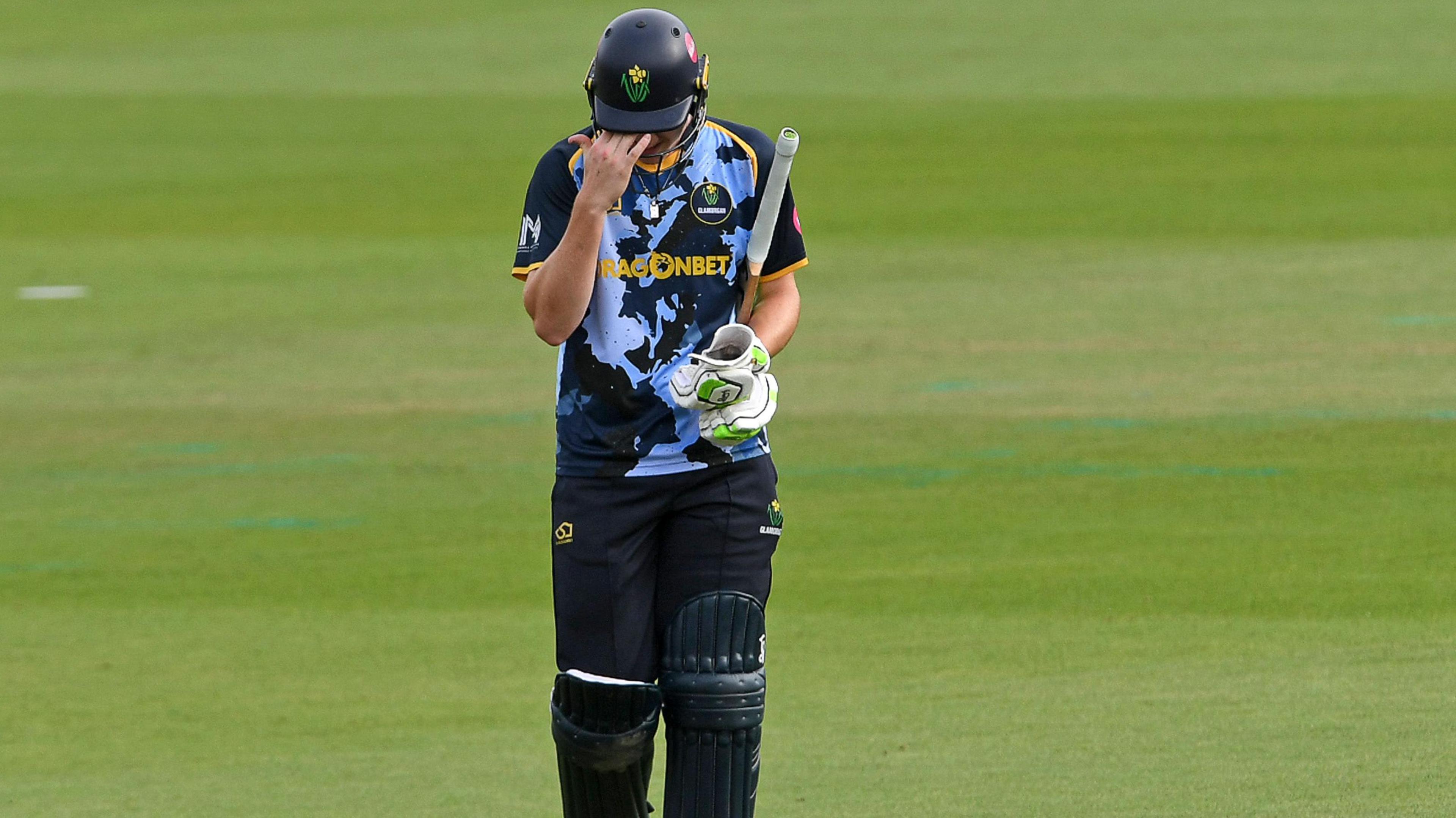 Ben Kellaway walks off the pitch after losing his wicket at Sophia Gardens