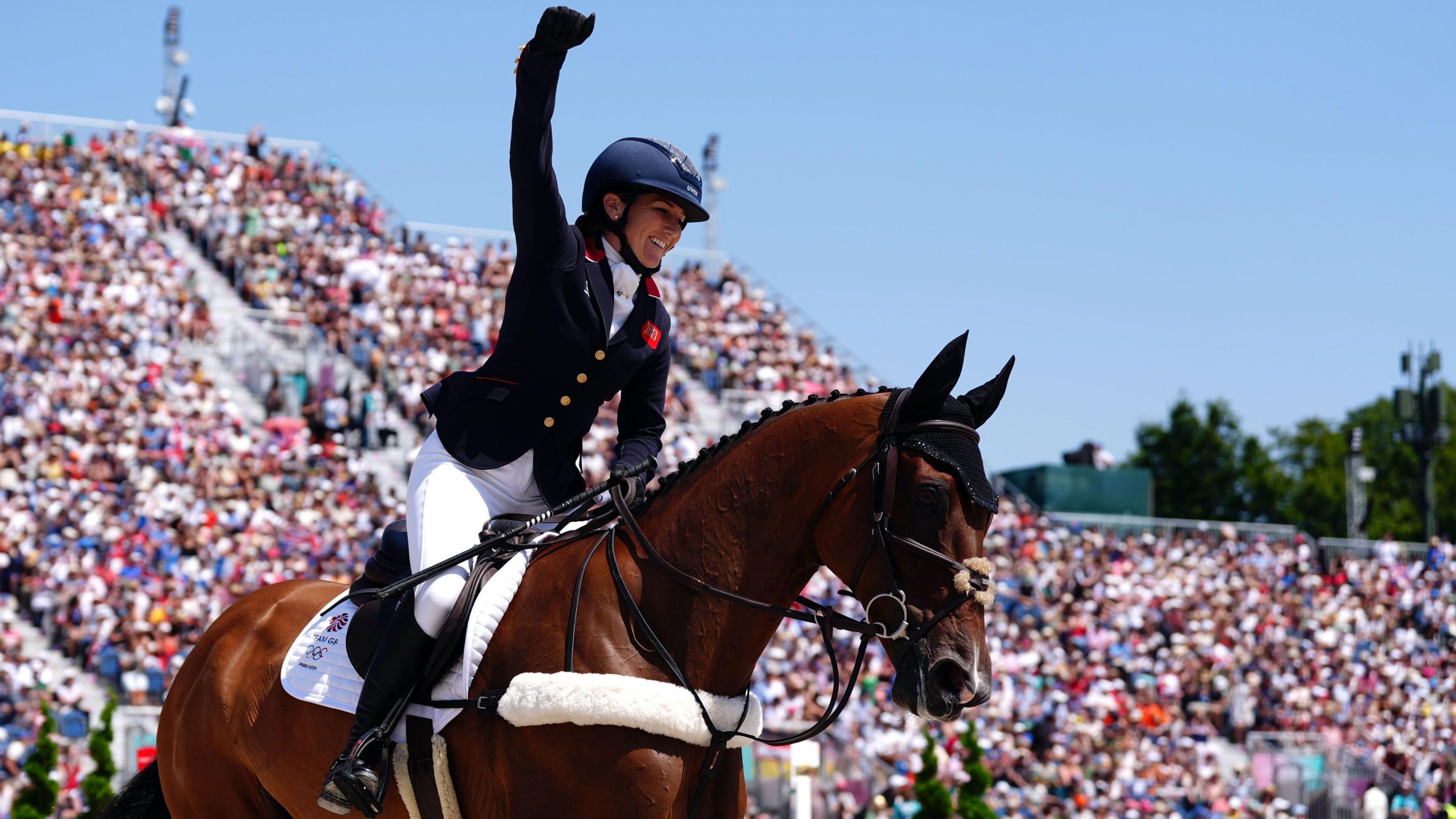 Laura Collett celebrating on her horse London 52