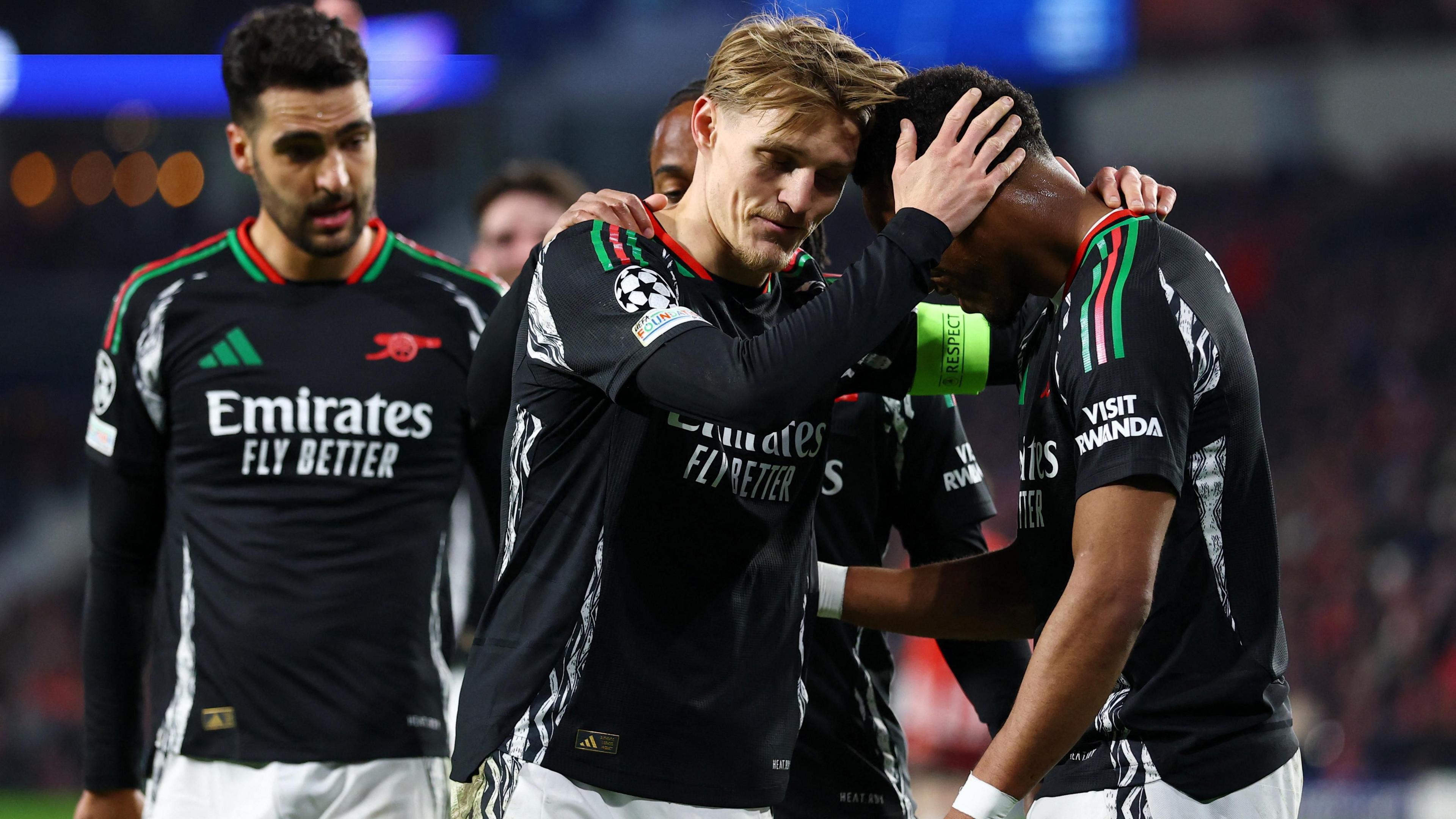 Martin Odegaard celebrates one of his goals with his Arsenal team-mates