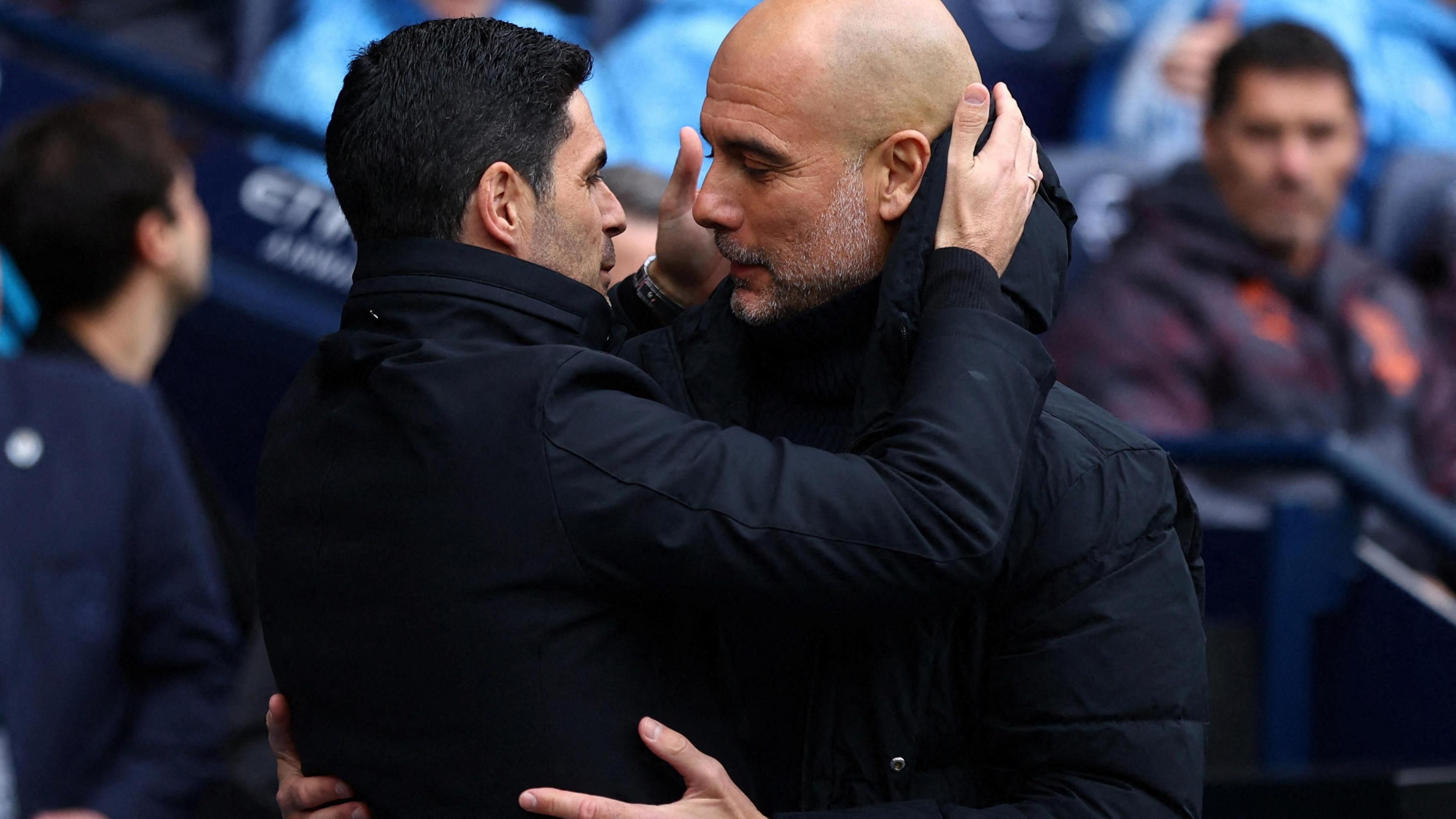 Arteta and Guardiola embrace