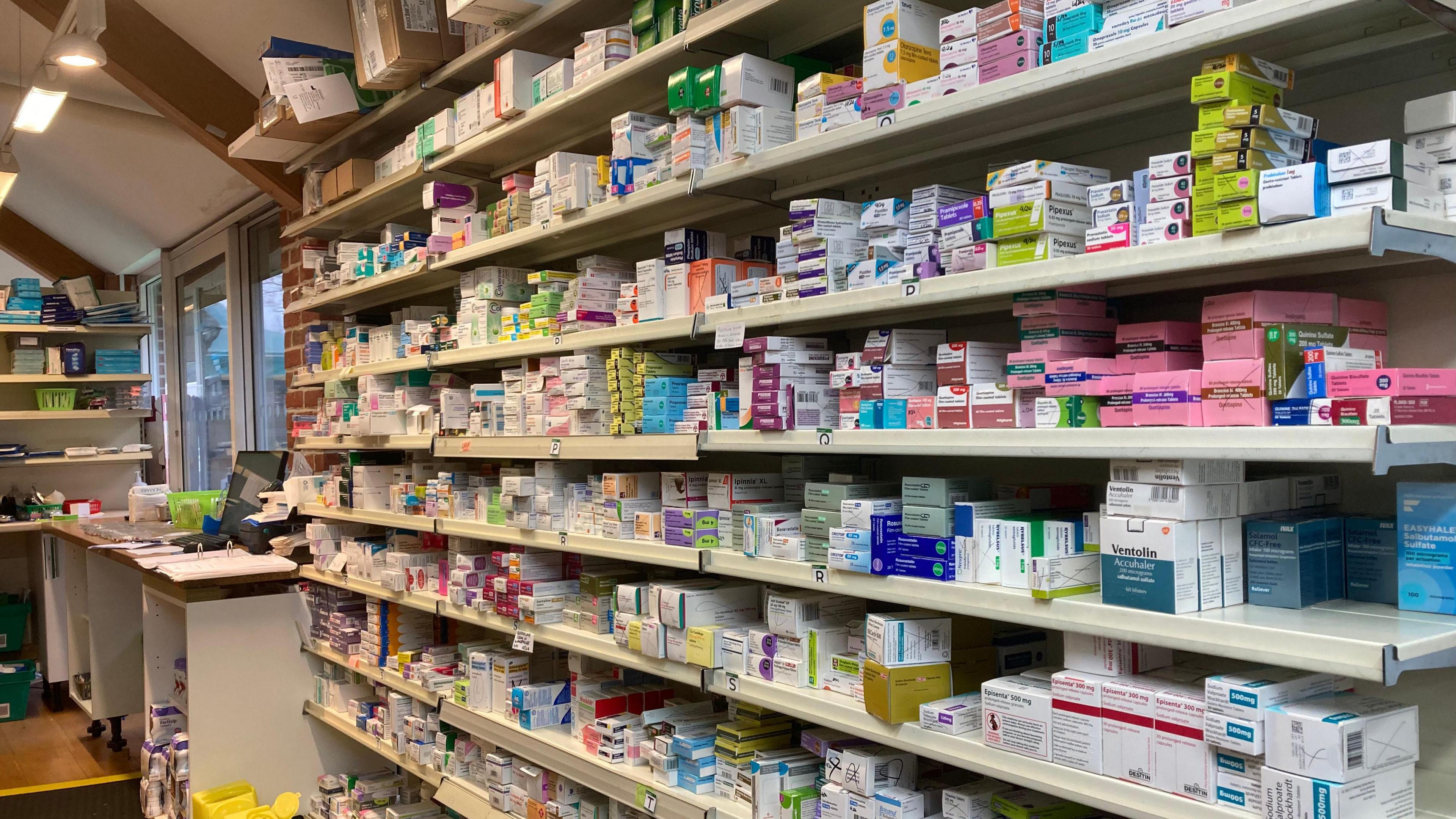 Shelves of medication in a dispensary