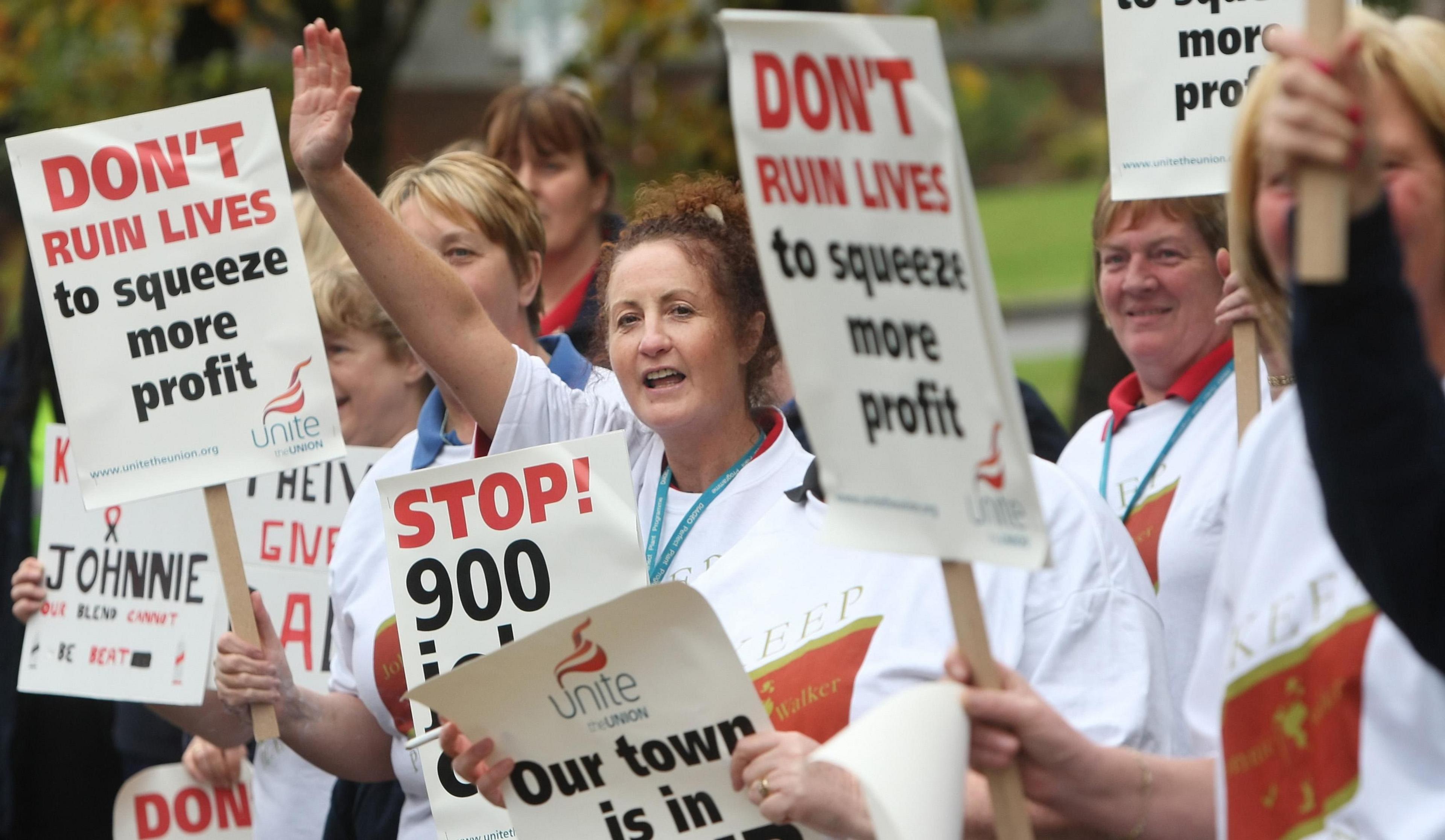 Workers protest outside the Johnnie Walker plant in Kilmarnock over planned job cuts