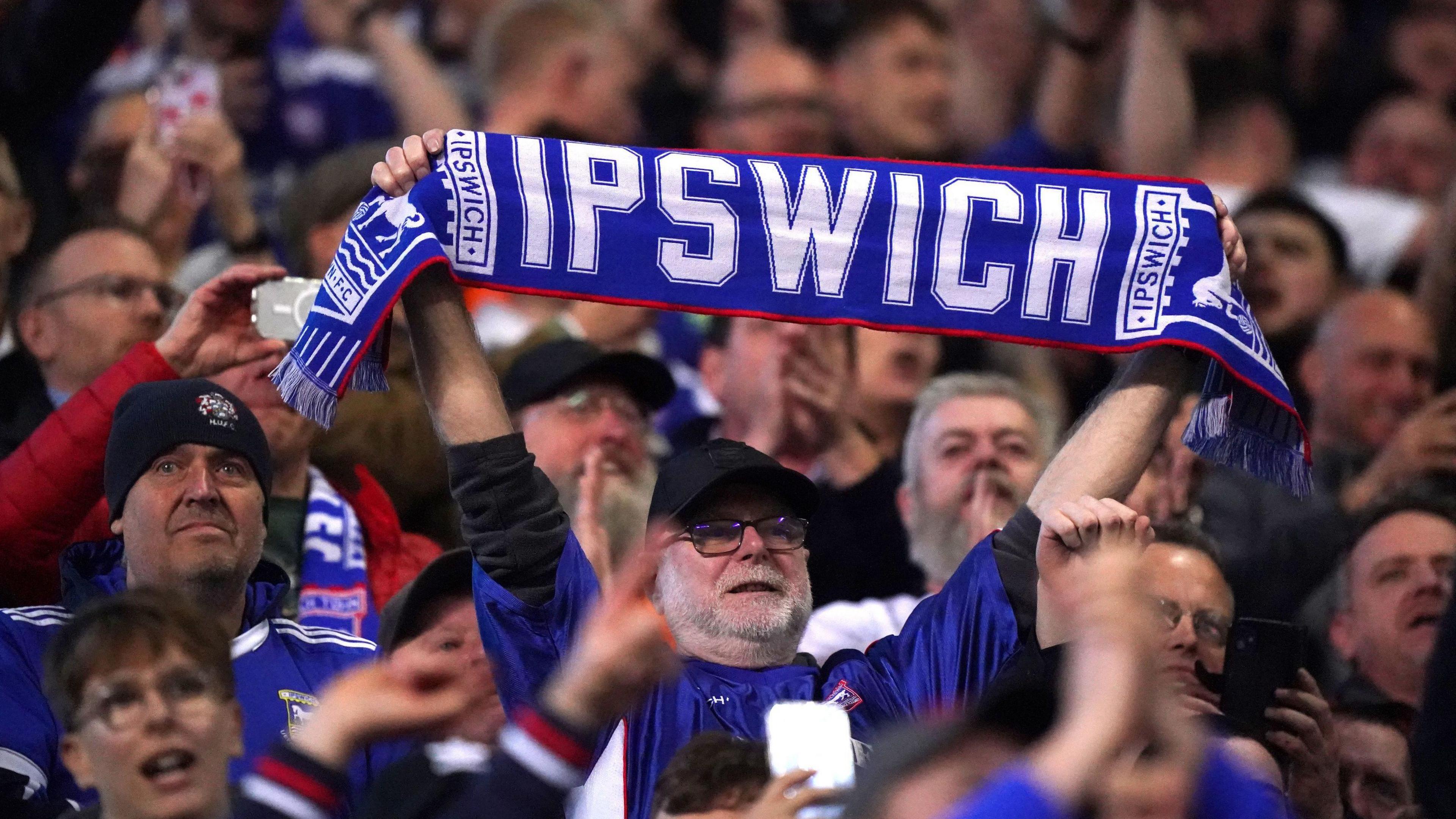 Ipswich Town fans celebrate after the Coventry win