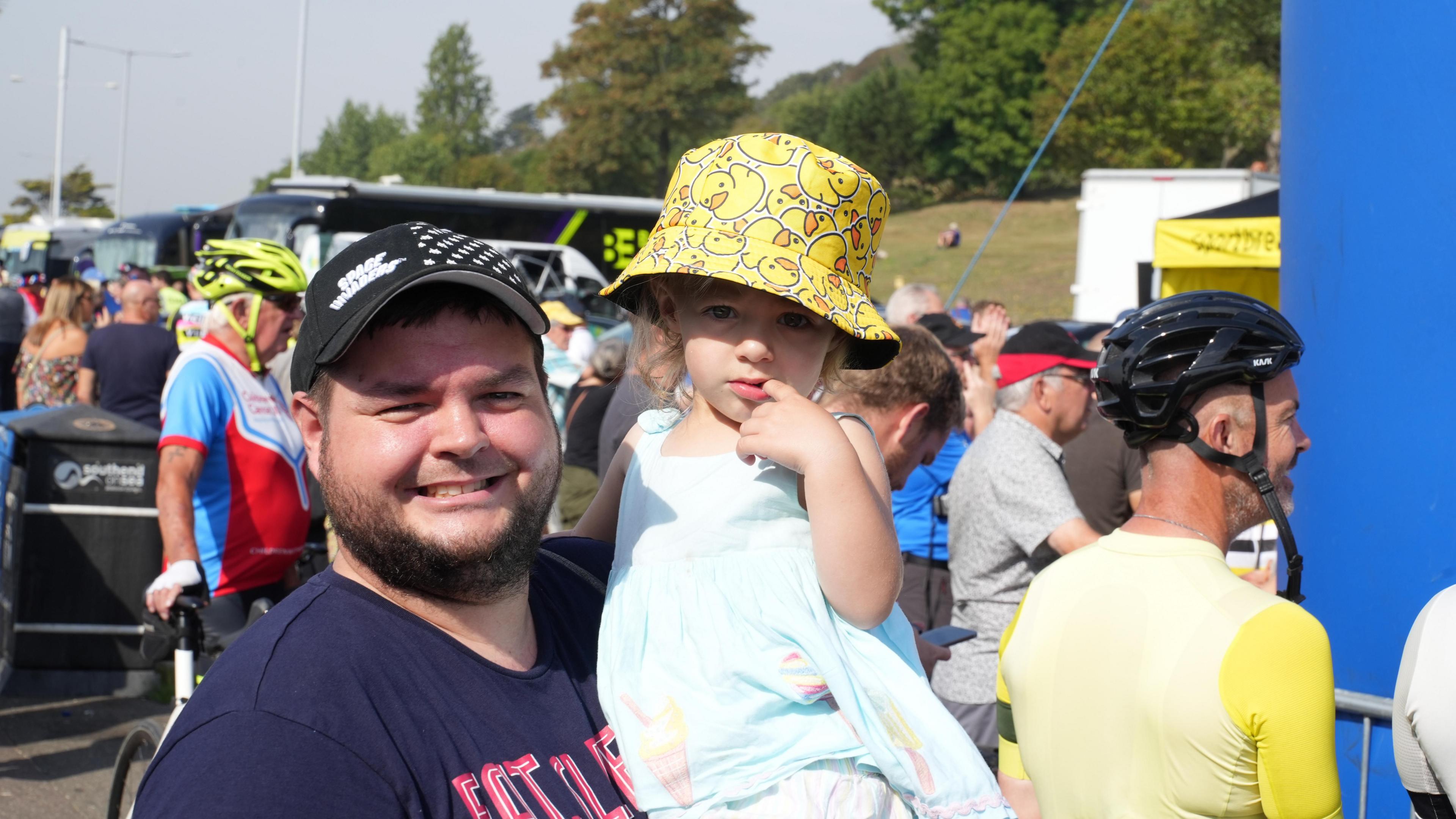 A man holding a small child