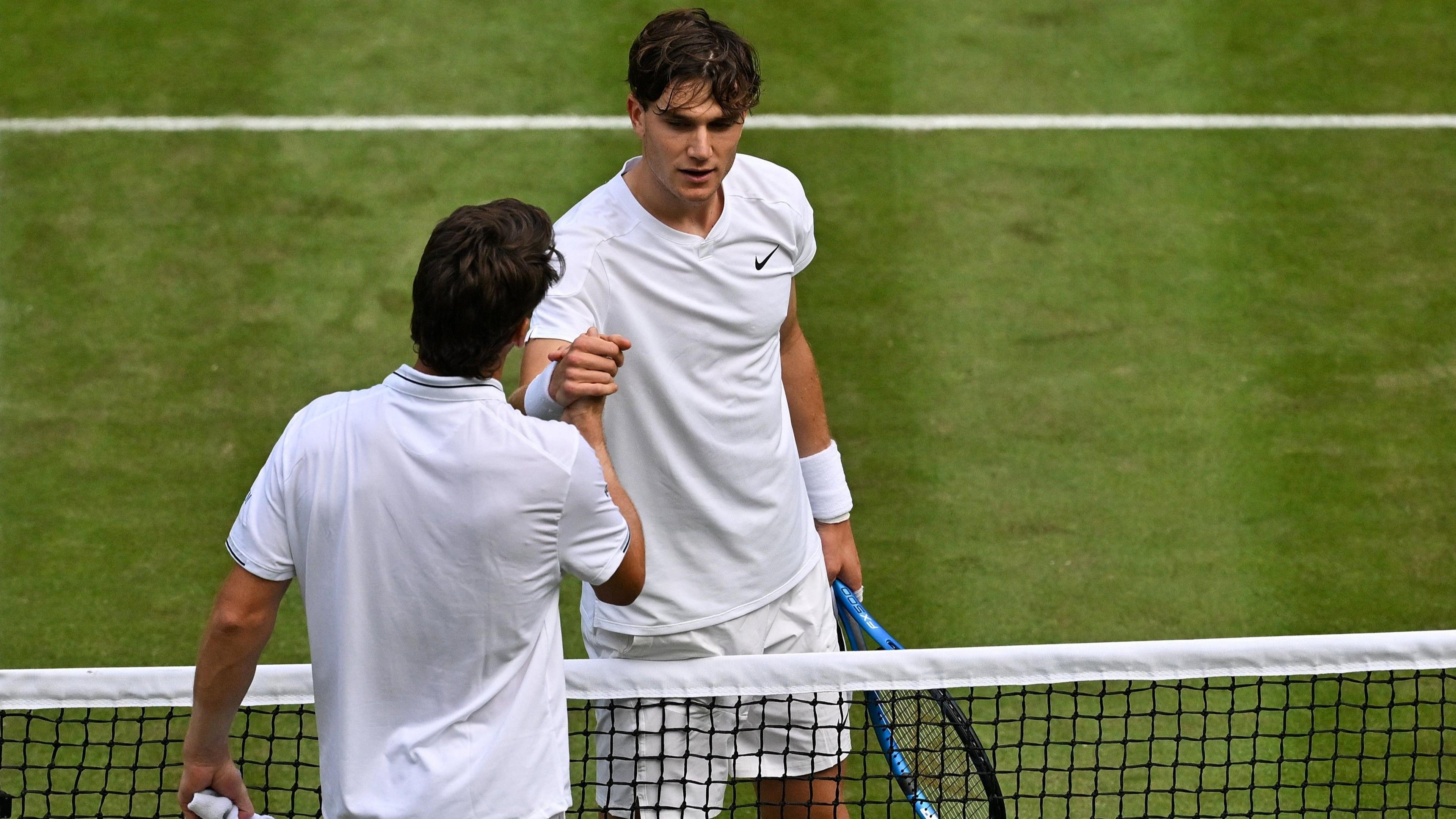 Jack Draper shakes hands with Cameron Norrie at Wimbledon in 2024