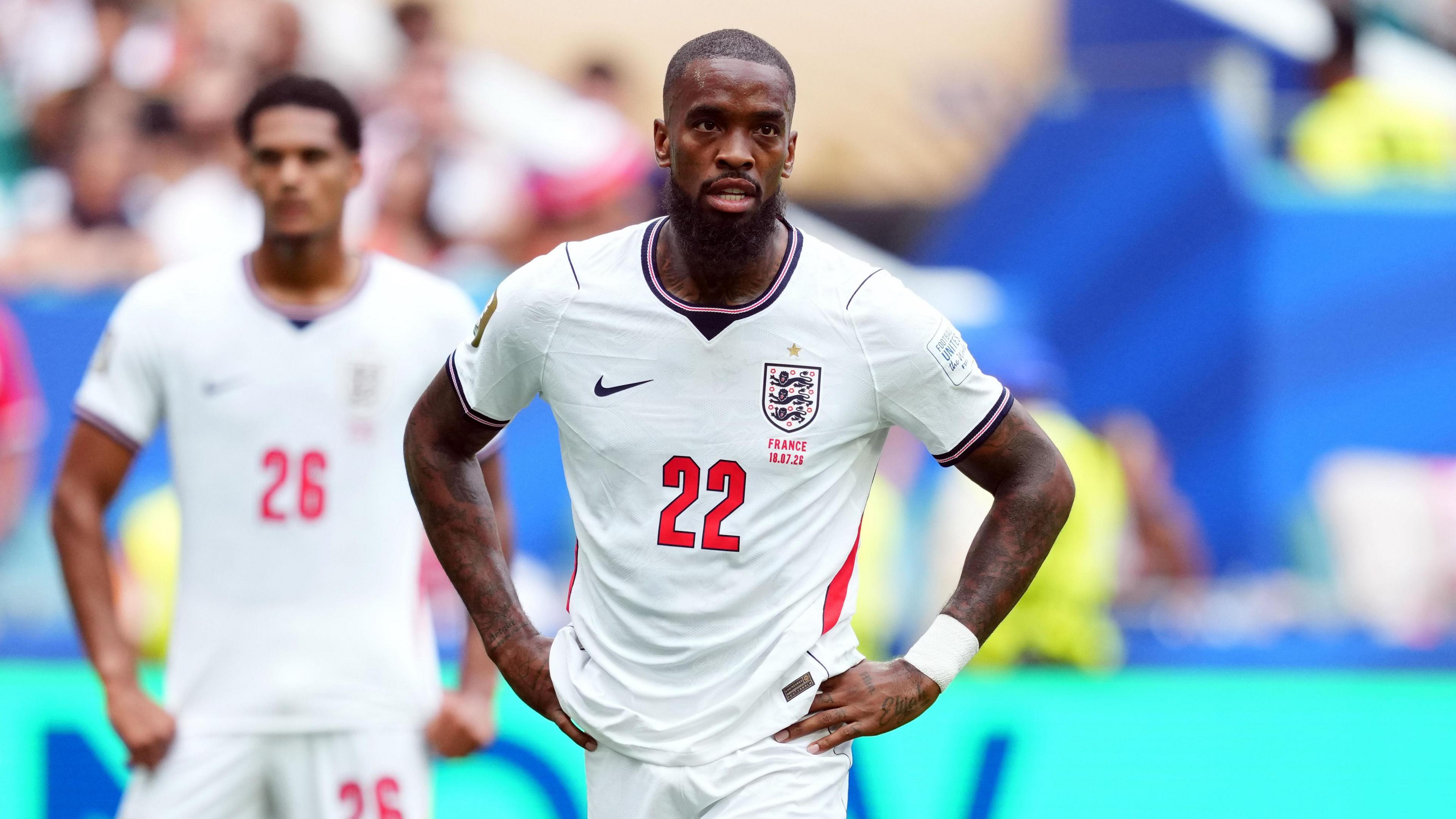 Ivan Toney in white England kit with 22 on front has hands on hips