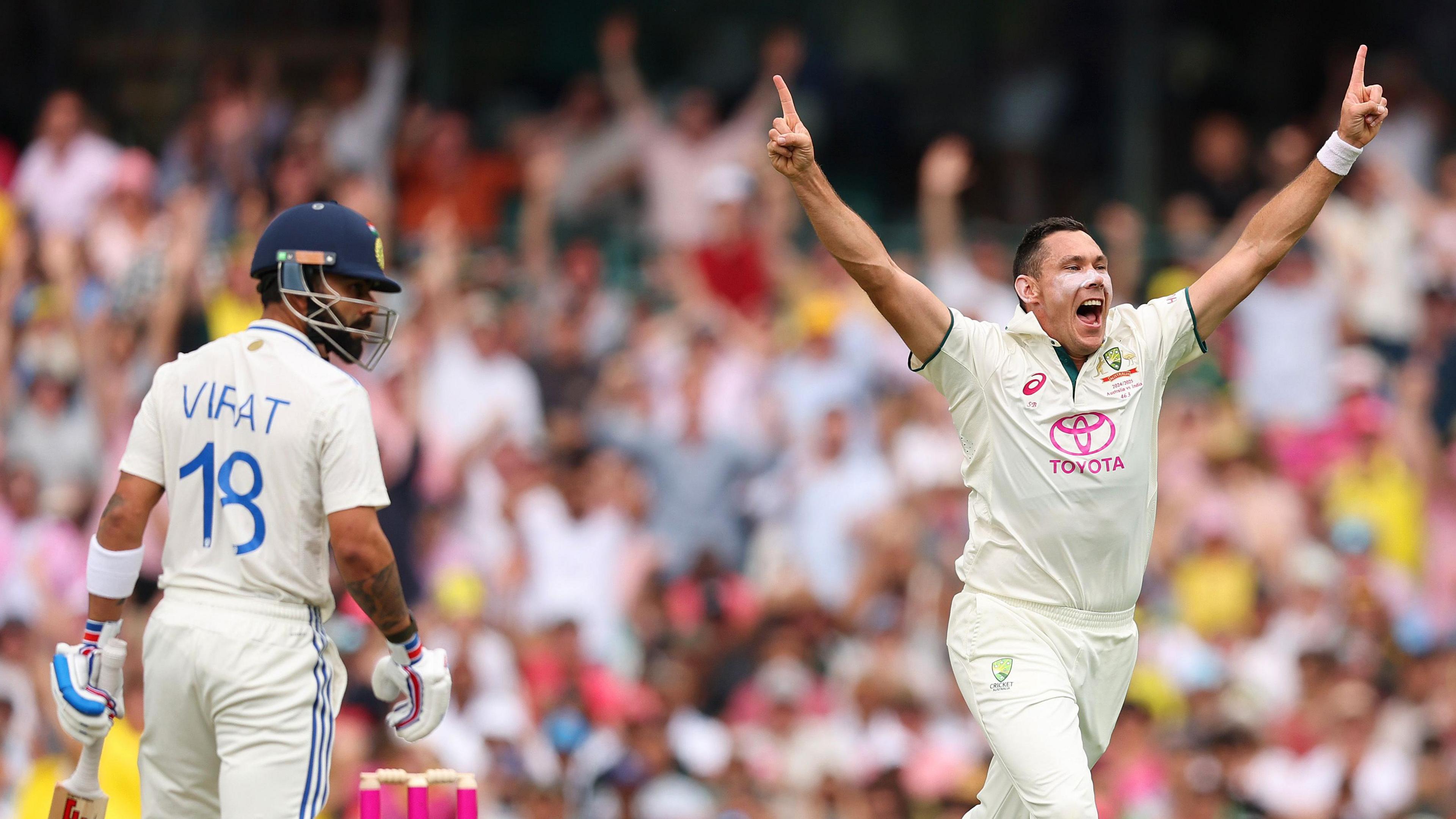 Scott Boland celebrates