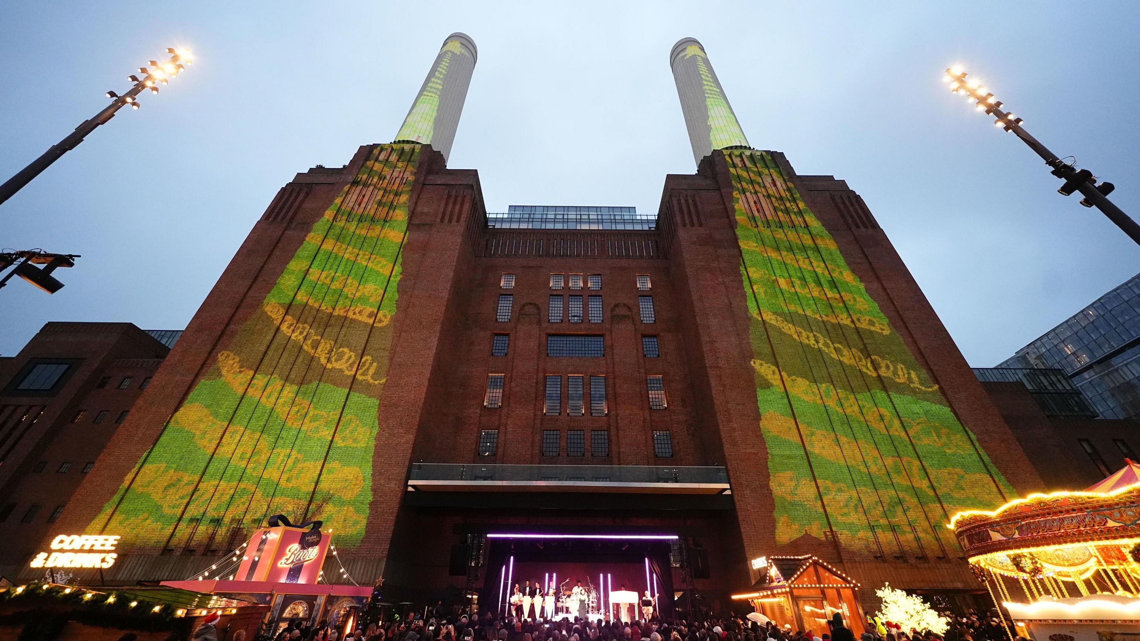 The singer Raye performed at the end of the King's visit to Battersea Power Station