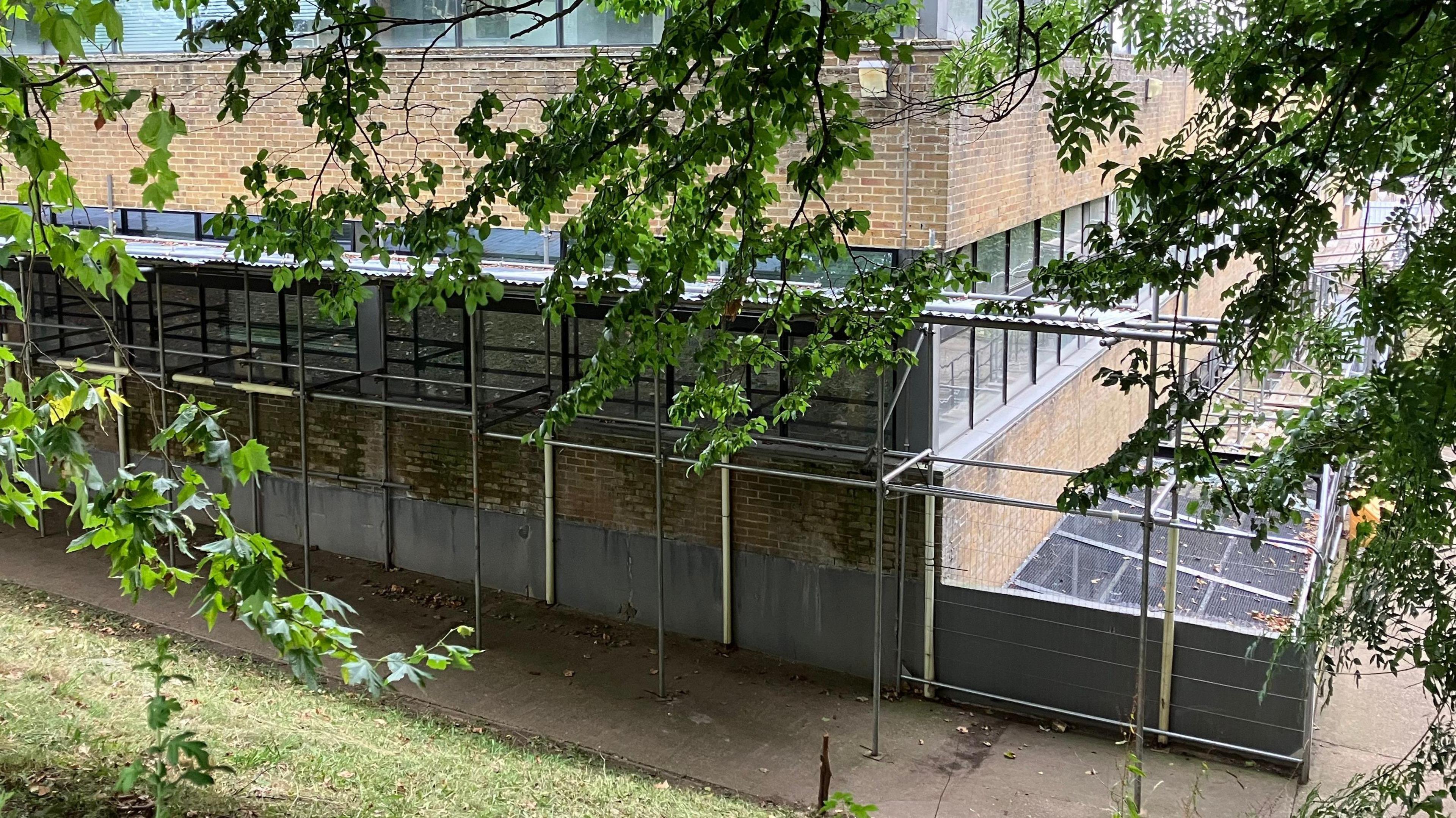 Scaffolding around the ground floor of the Bennett Buildings at the University of Leicester