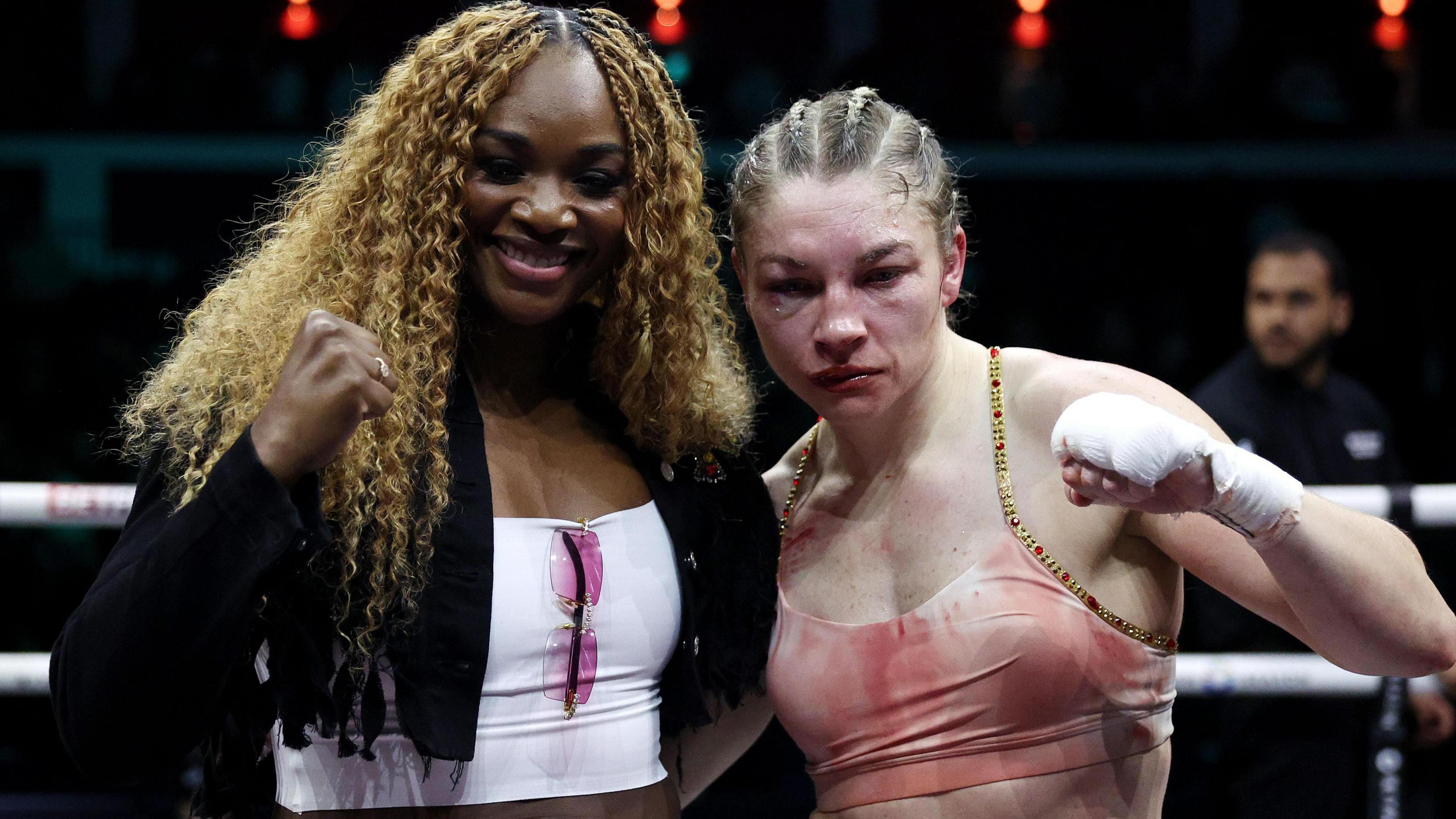 Claressa Shields and Lauren Price pose for photos after her win over Stephanie Pineiro