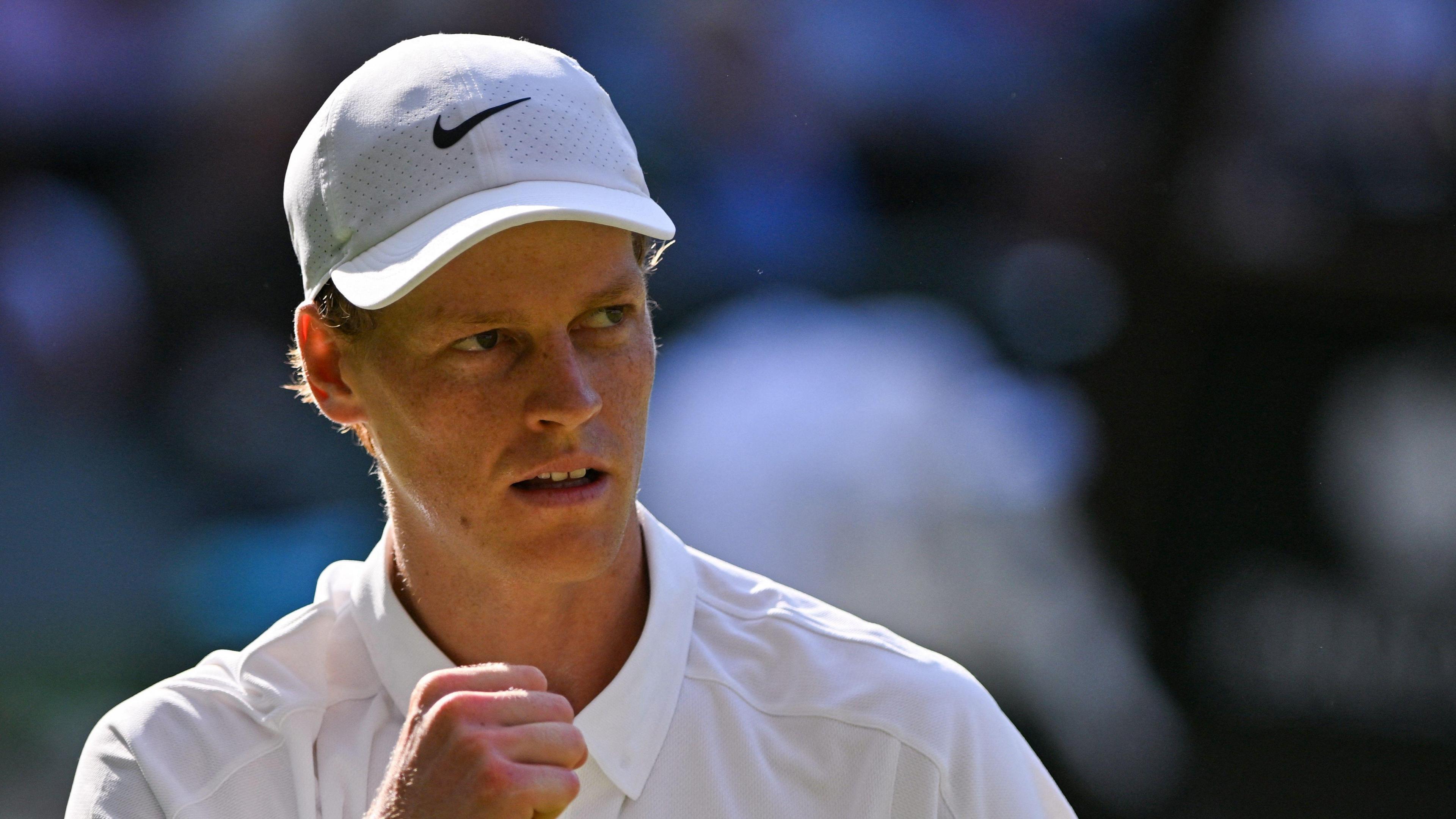 Jannik Sinner celebrates during semi-final match against Novak Djokovic at Wimbledon Centre Court 