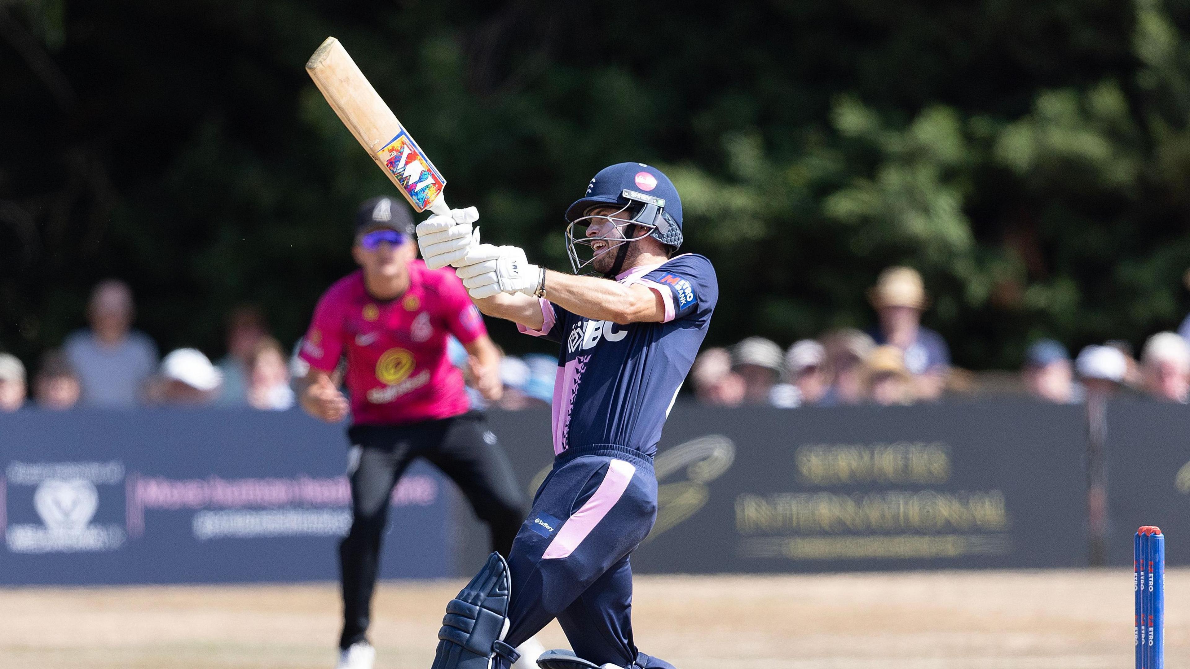 Middlesex's Joe Cracknell plays an attacking drive against Sussex at Radlett
