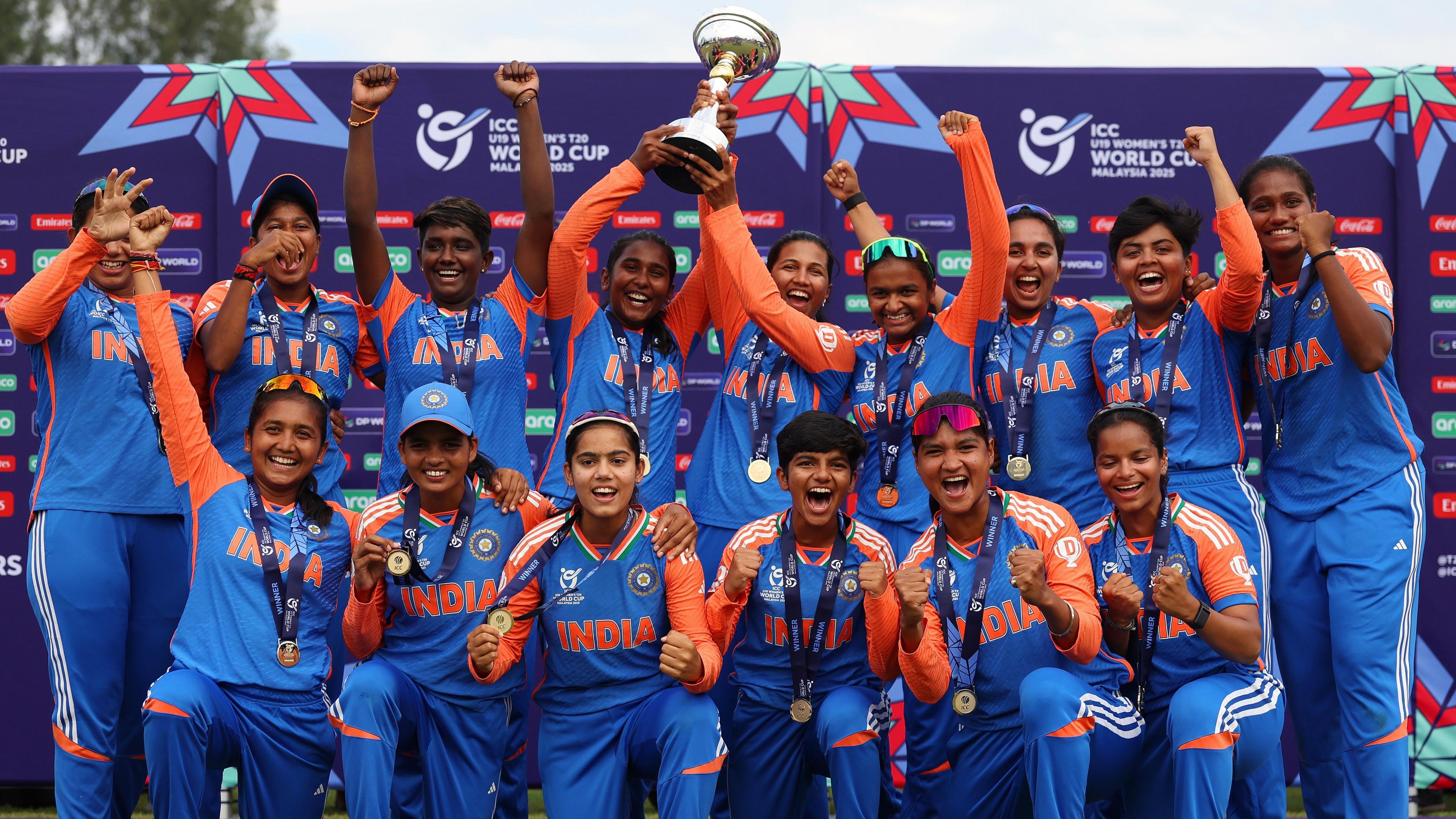 India players celebrate with the trophy after winning the 2025 Women's Under-19 T20 World Cup, beating South Africa in the final in Kuala Lumpur