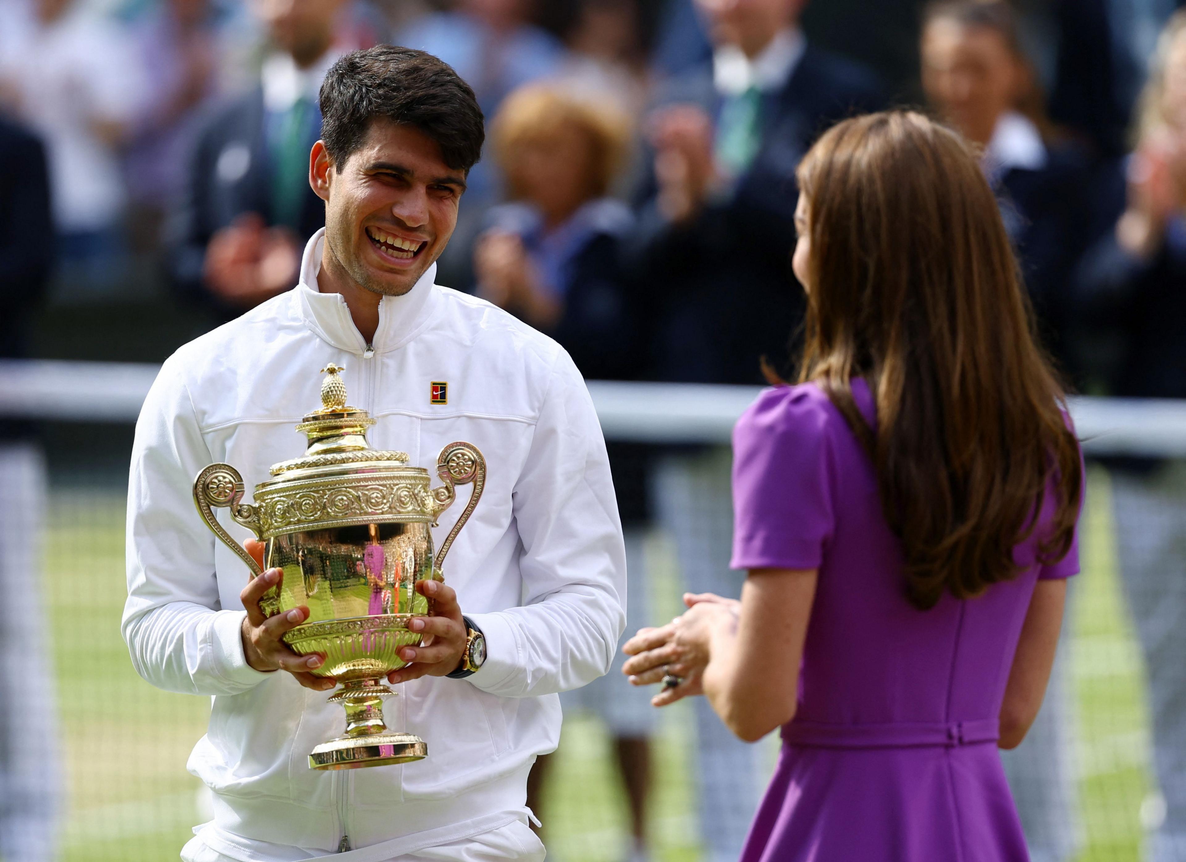 Catherine Princess of Wales presents Wimbledon Men's singles trophy to Carlos Alcaraz