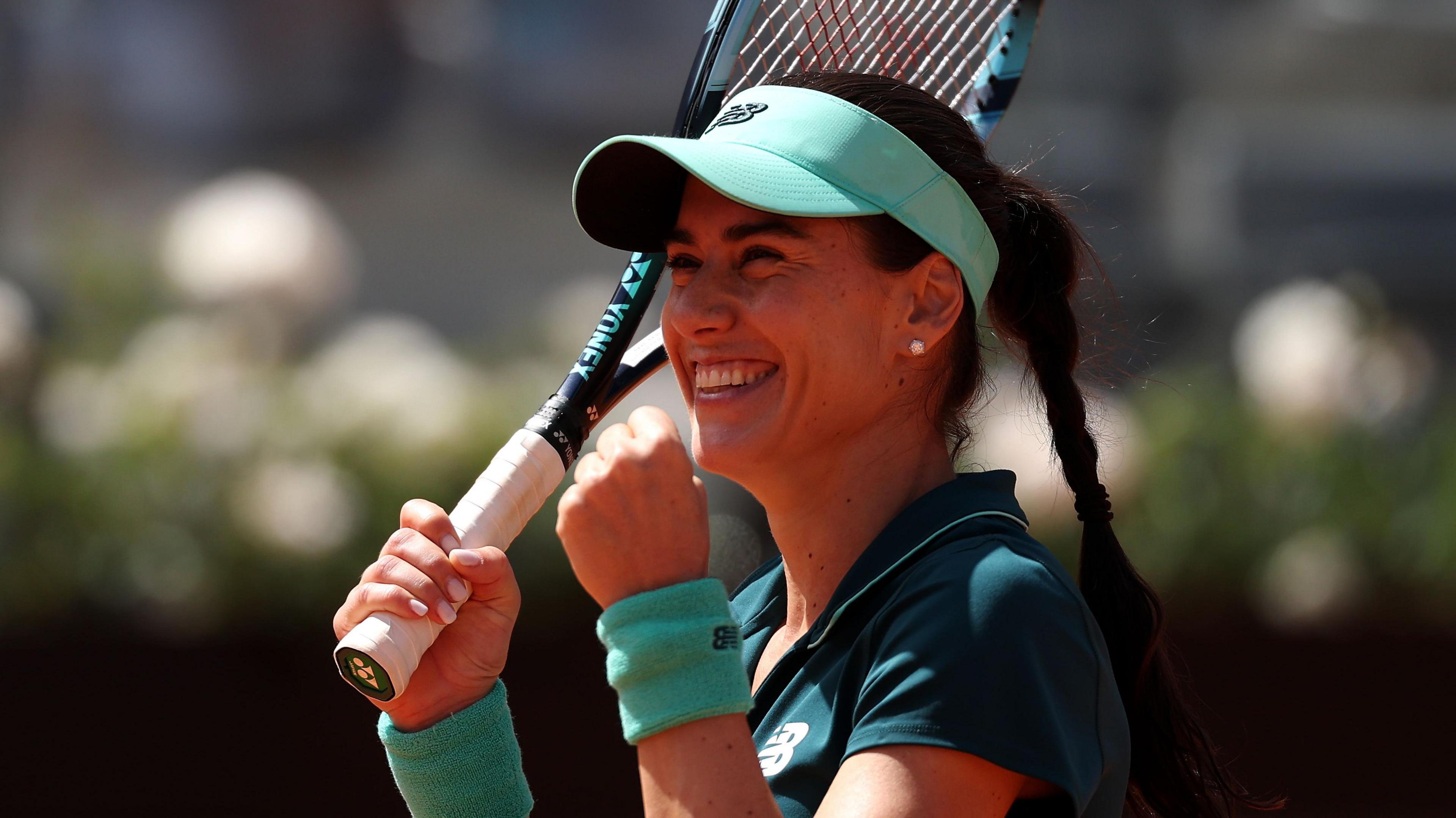 Sorana Cirstea celebrates reaching the Italian Open semi-finals