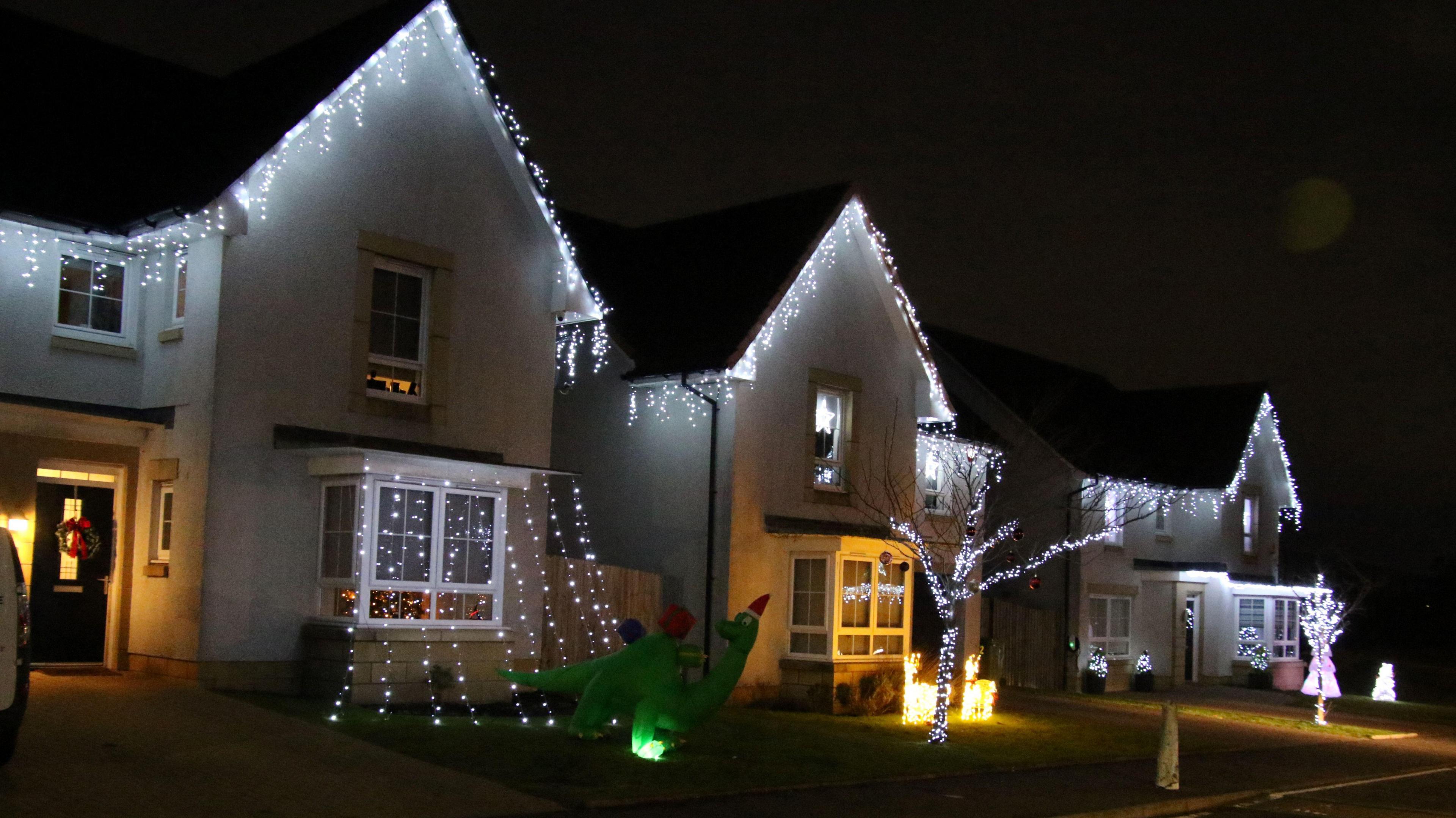 Rows of houses with lights