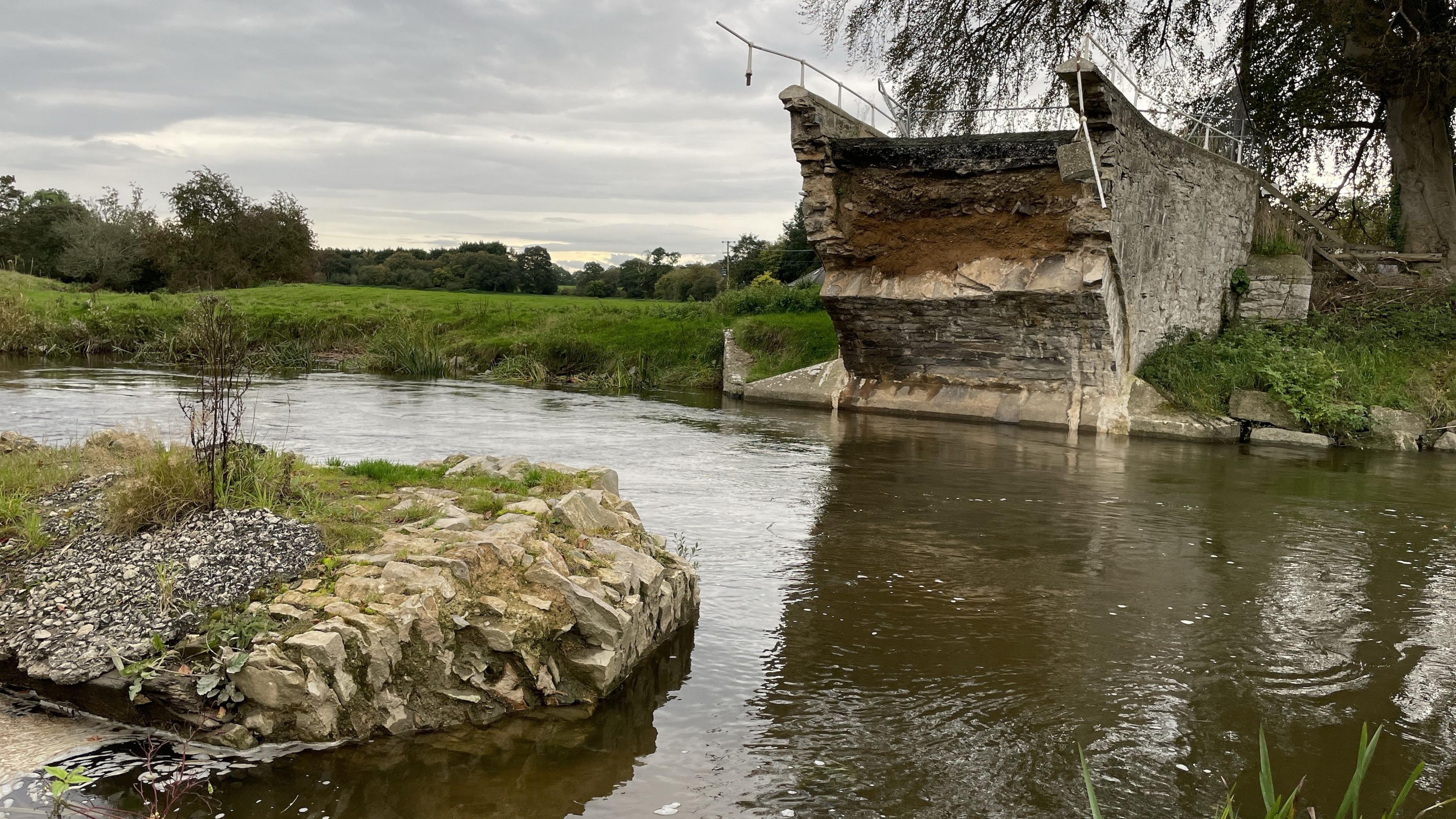 The remains of Llanerch Bridge on the River Clwyd between Tremeirchion and Trefnant in Denbighshire