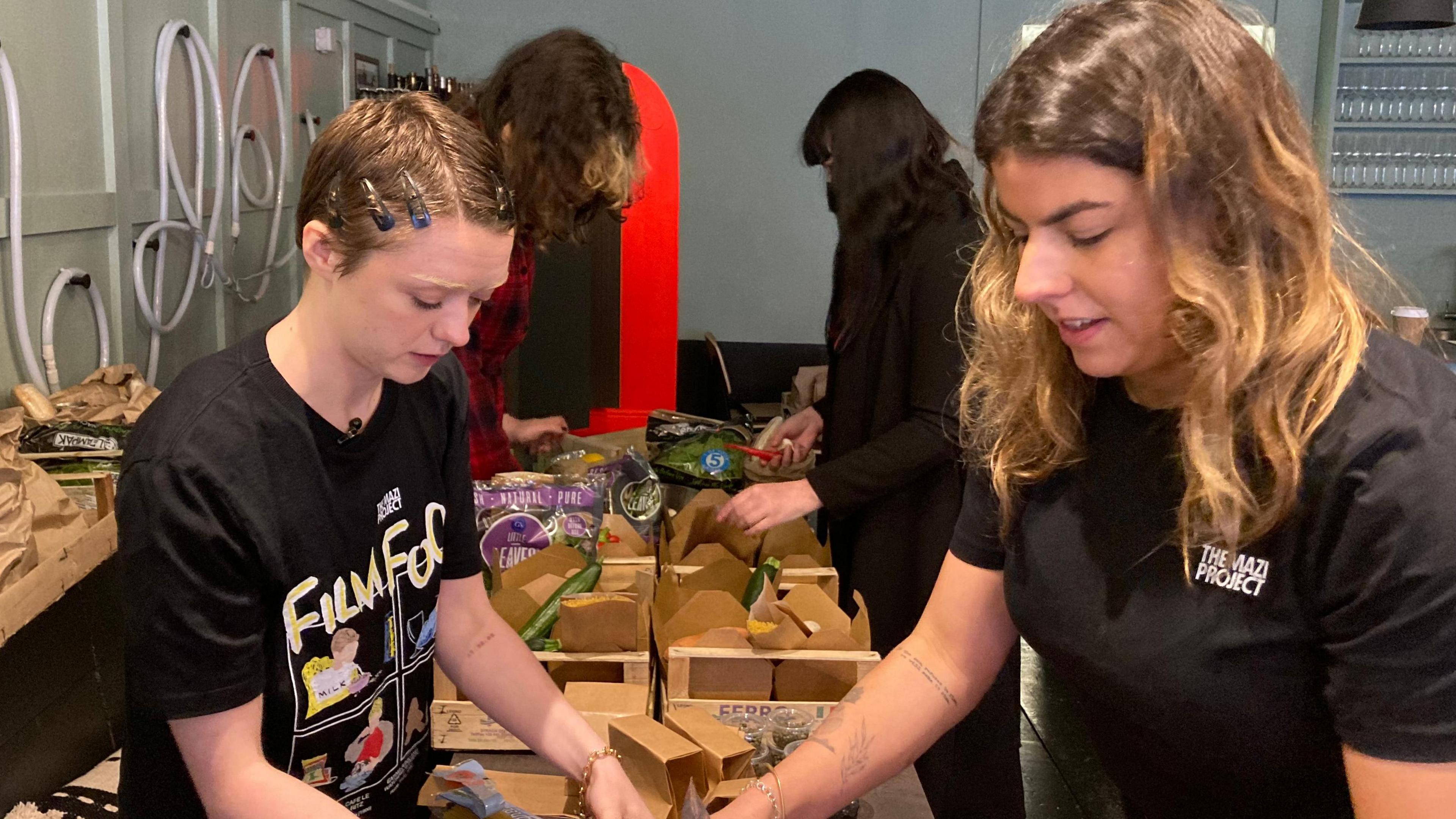 Vegetable boxes are packed for disadvantaged young people in Bristol