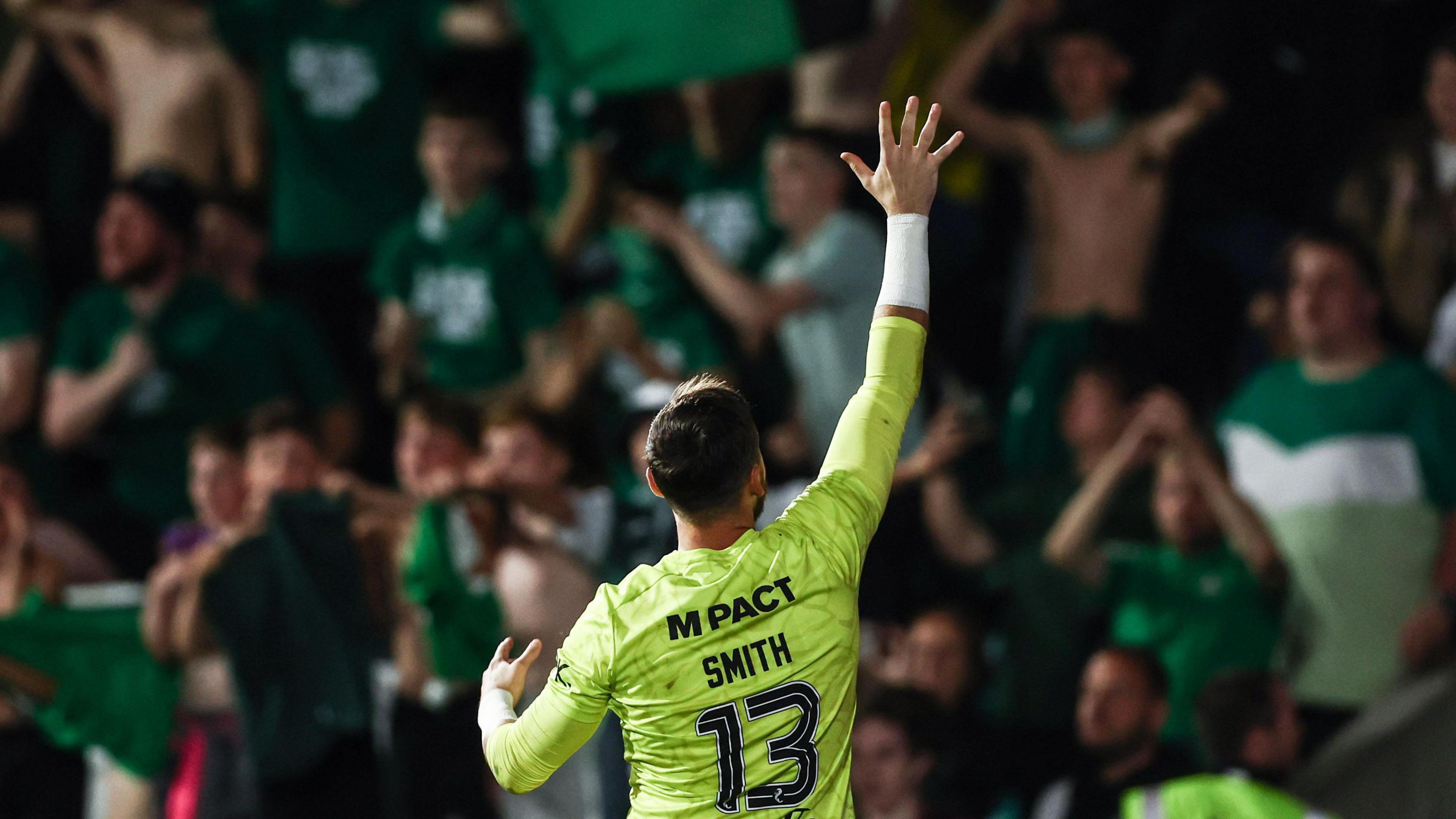 Jordan Smith waves to Hibs fans at full-time