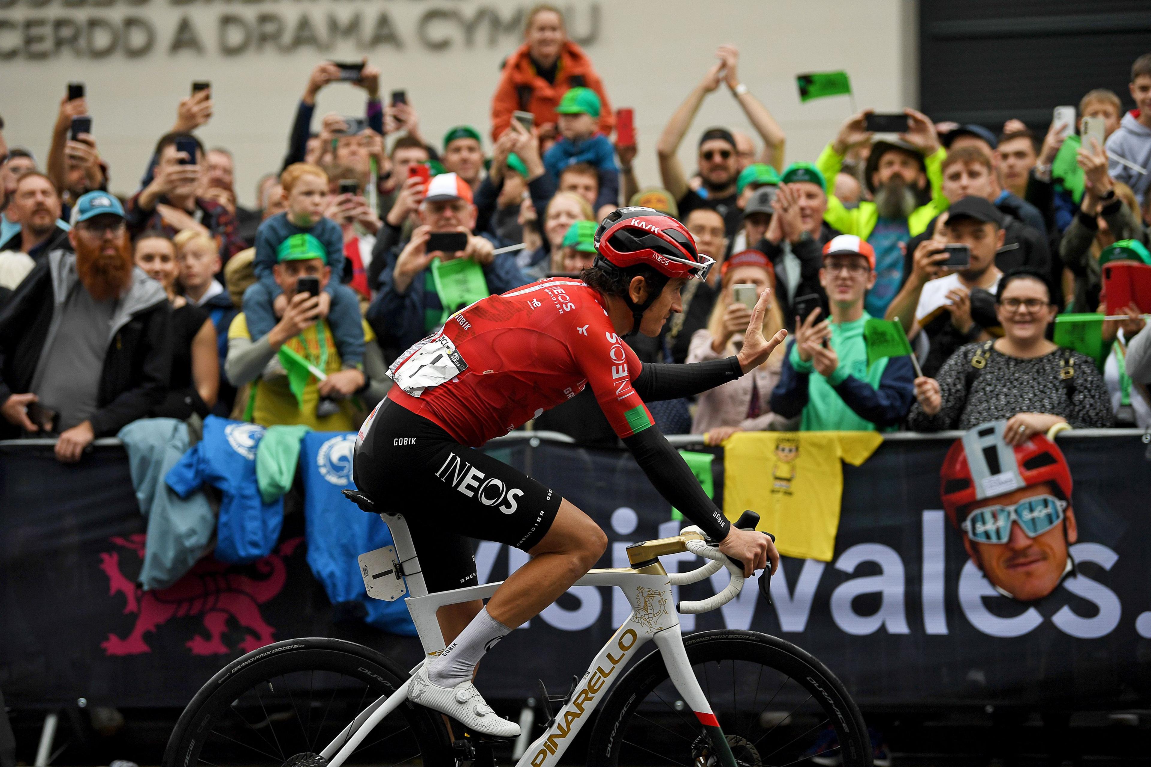 Geraint Thomas acknowledges the support of the crowd as he nears the finish line in Cardff