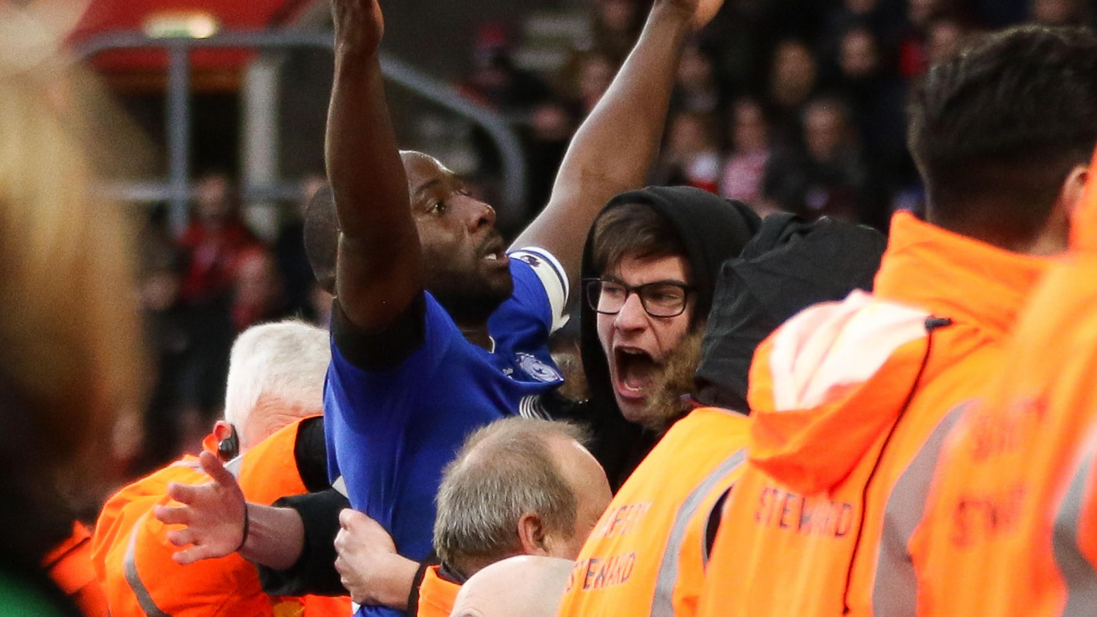 Sol Bamba (left) celebrates scoring for Cardiff at Southampton and is hugged by Cardiff fan Noah Bushby