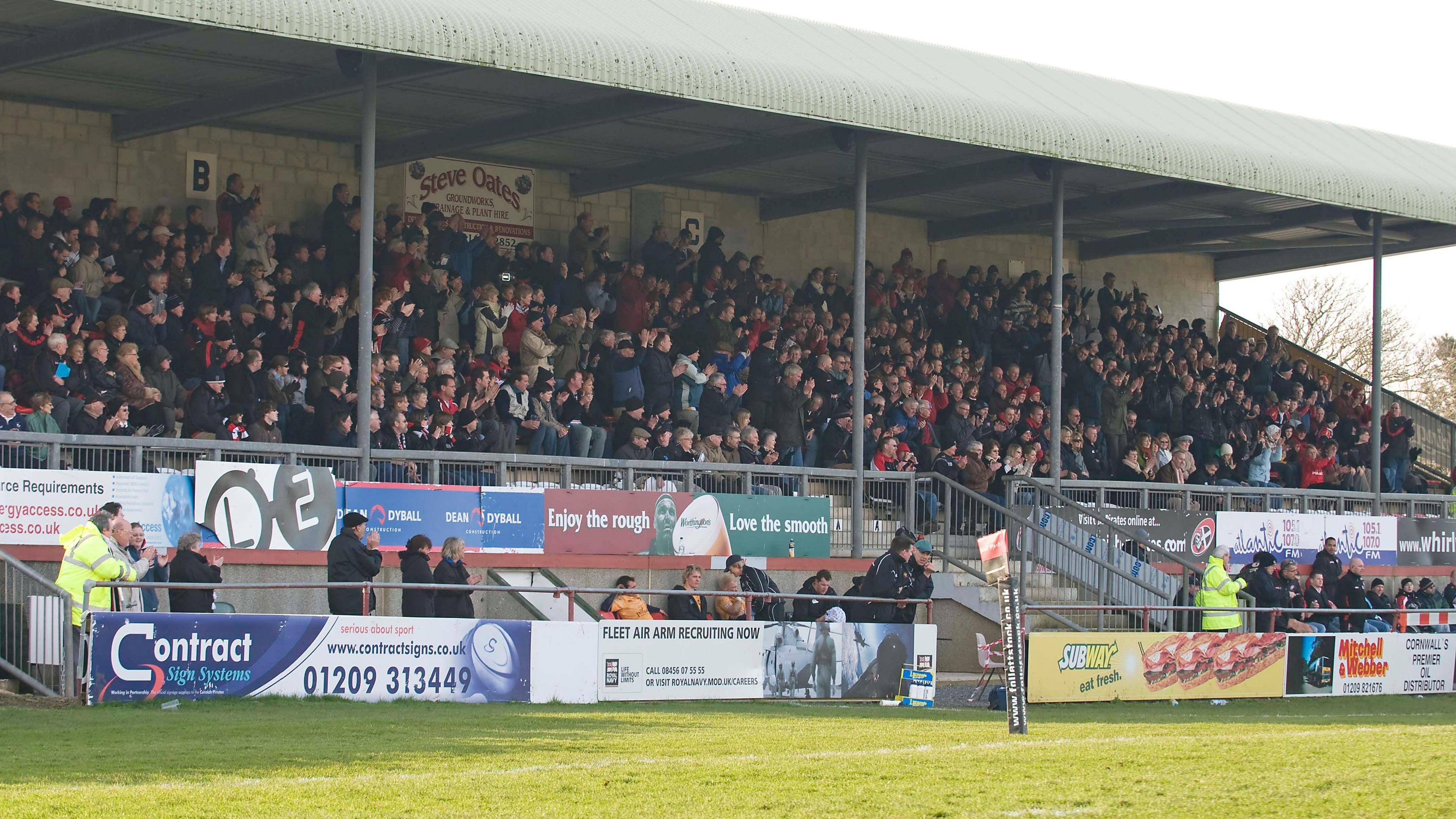 A packed main stand at Camborne for a Cornish Pirates game in the late 2010's 