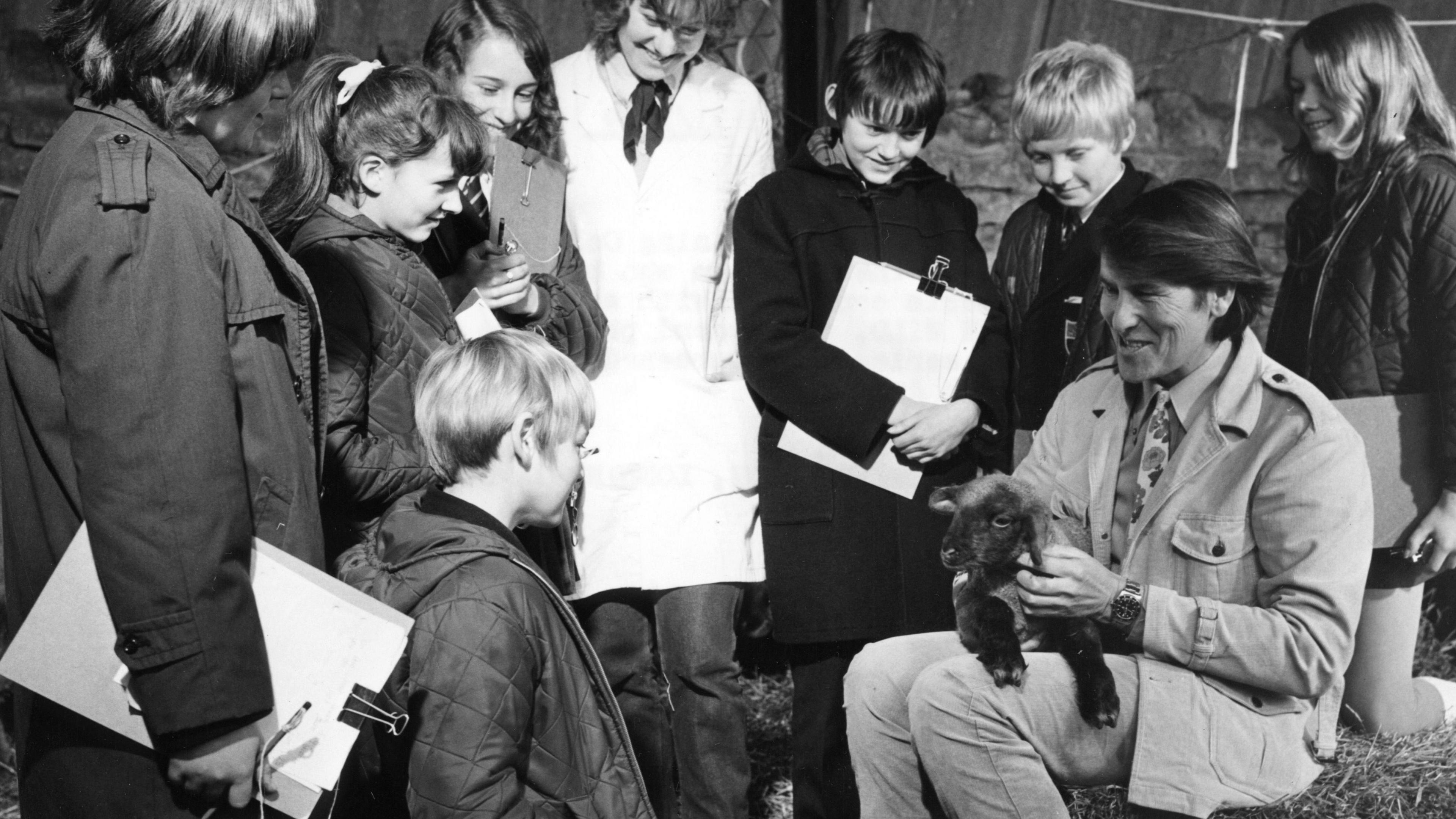 Picture shows - Tony Soper at Newton Park Training College, Bath, with some of the children who have been working on projects concerned with animal behaviour.