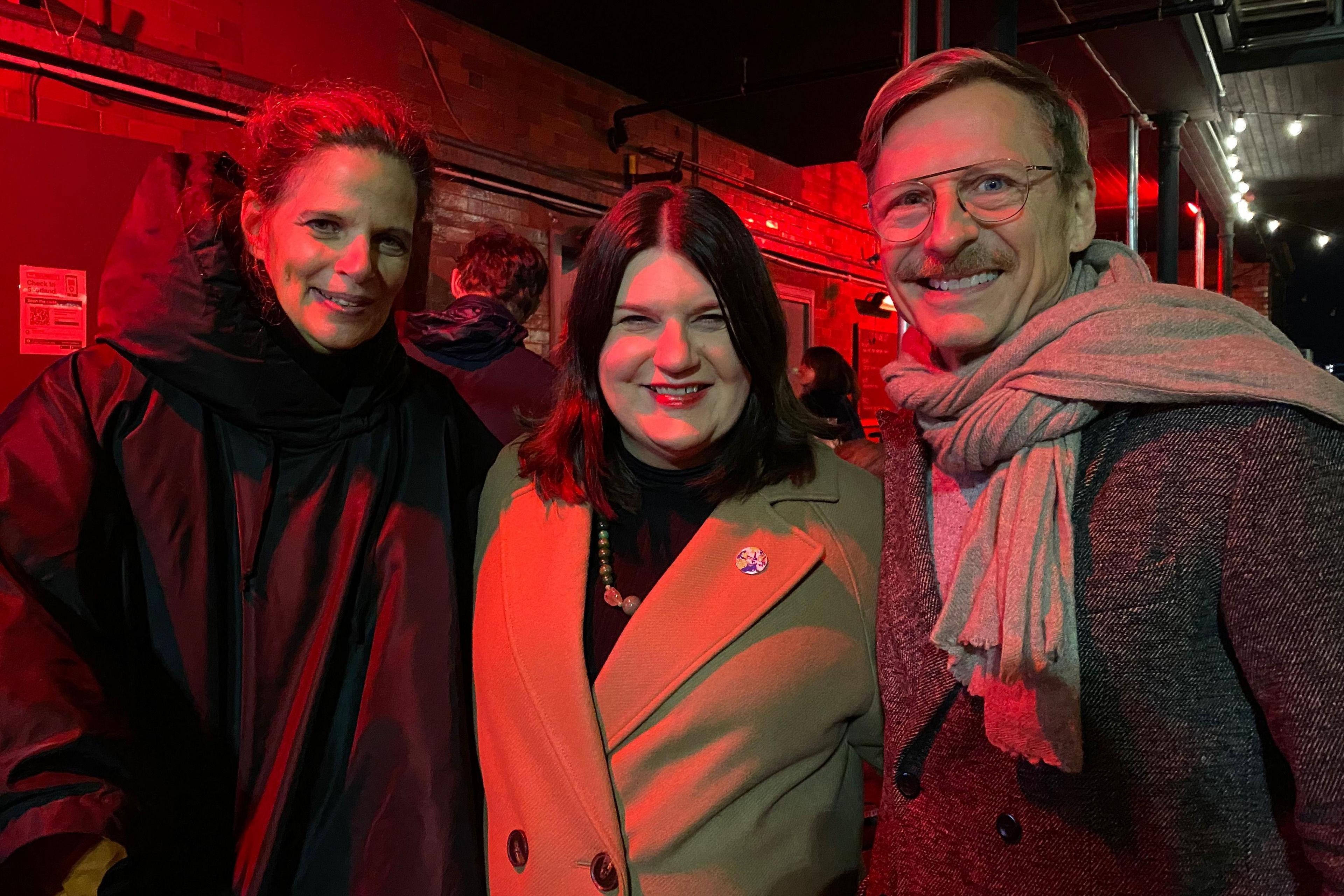 Mary Ellen with two people under “indestructible language” 