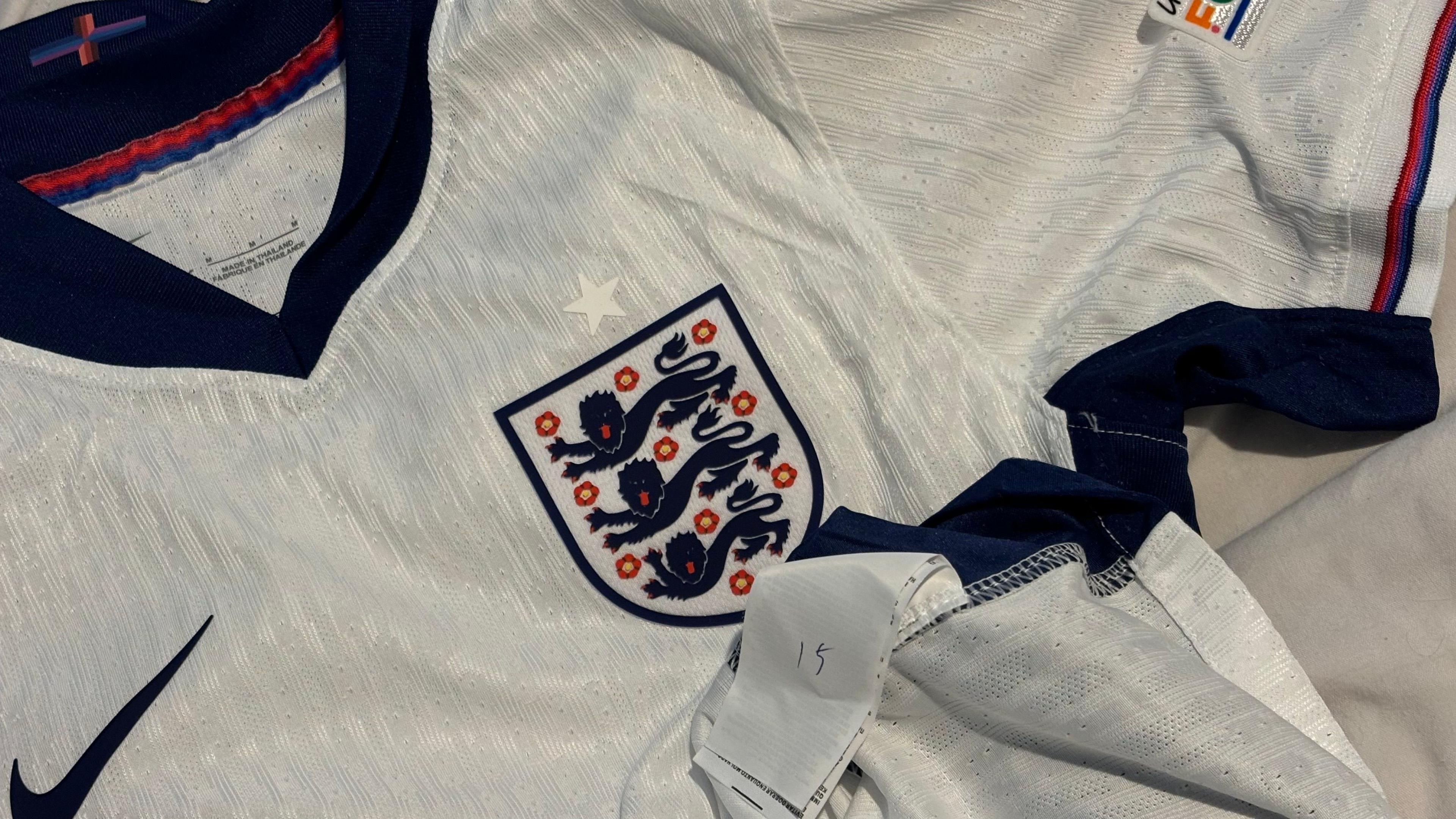 Fake England shirt.