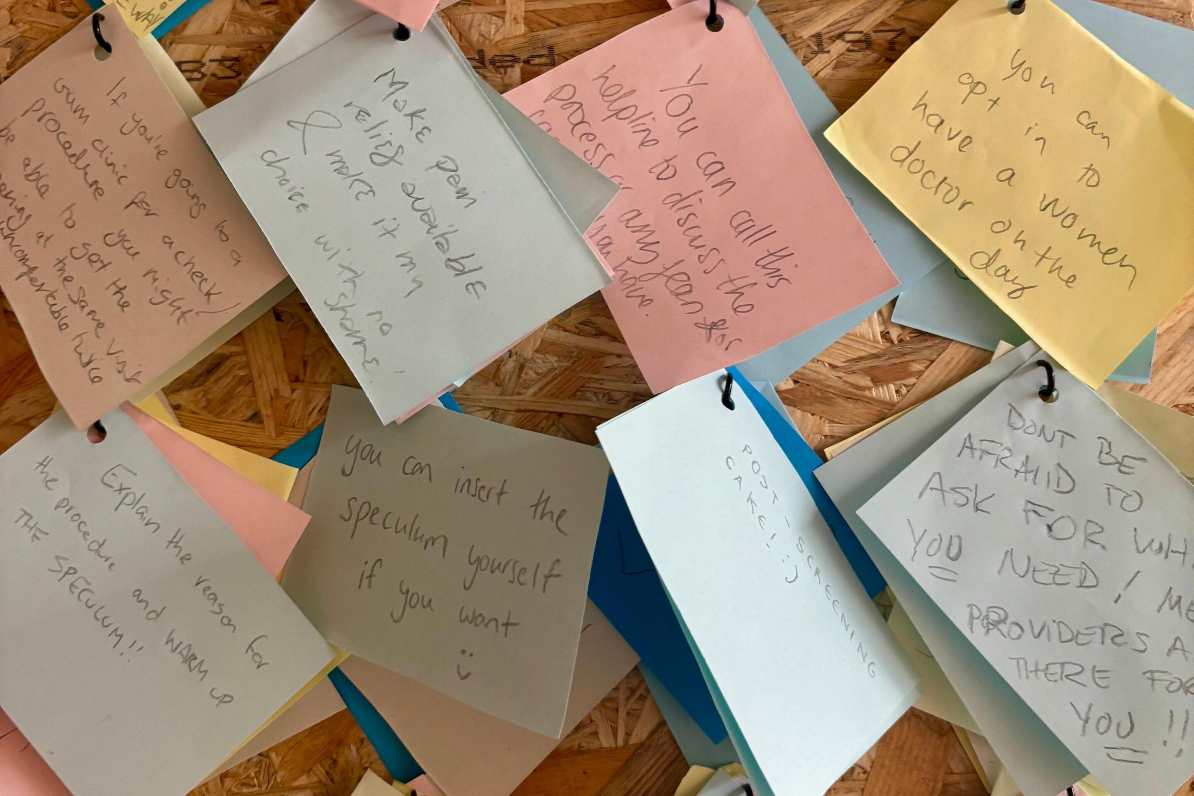 Eight pieces of different coloured paper, each with handwritten notes about things that can be done to make the cervical screening process more comfortable, like "you can insert the speculum yourself if you want" and "make pain relief available & make it my choice with no shame"