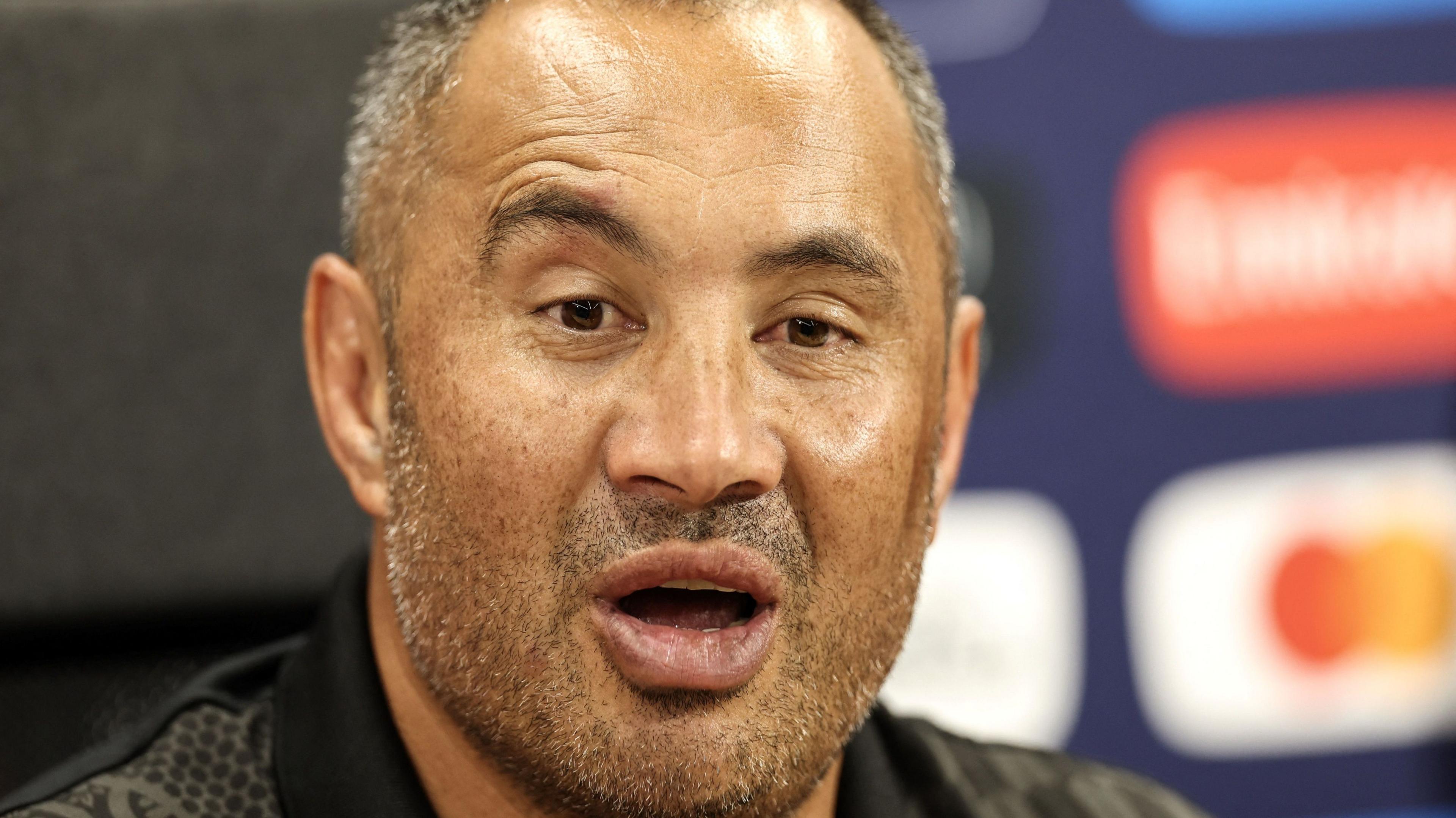 Riki Flutey speaks during a press conference. 