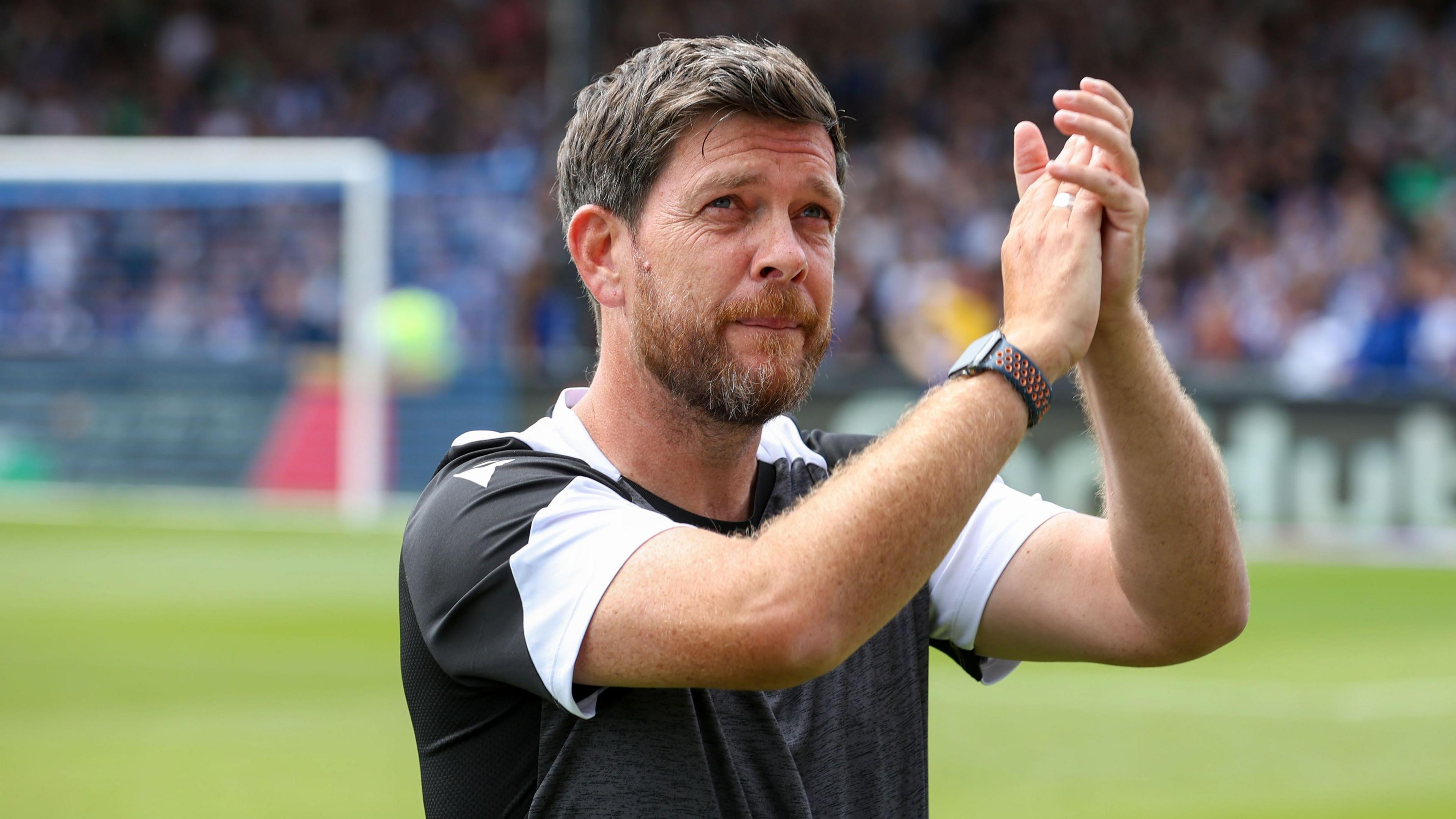 Darrell Clarke clapping