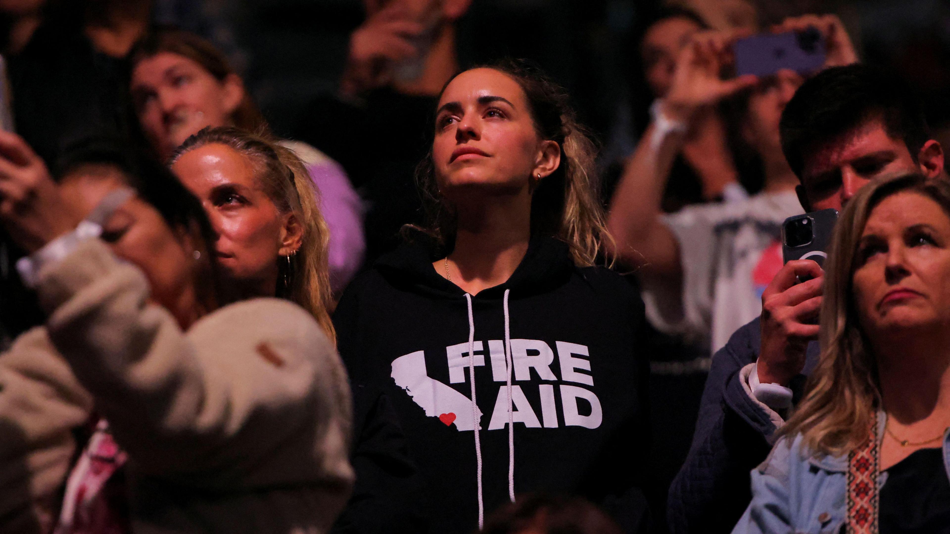 person attending fire aid concert in LA