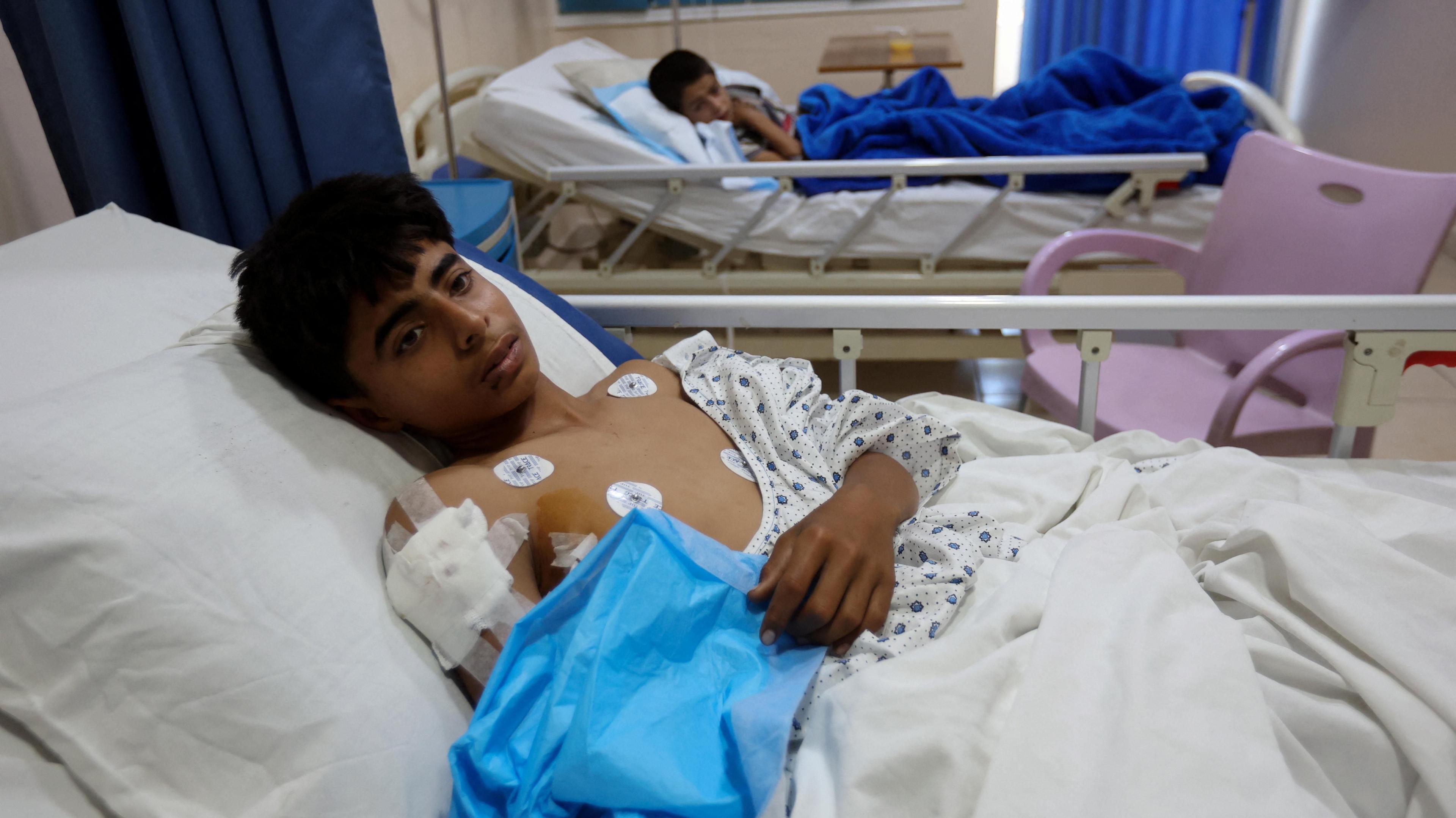 Ismail al-Malla, a Syrian boy who was injured during Israeli strikes, receives treatment at at a hospital in Tyre, southern Lebanon (24 September 2024)