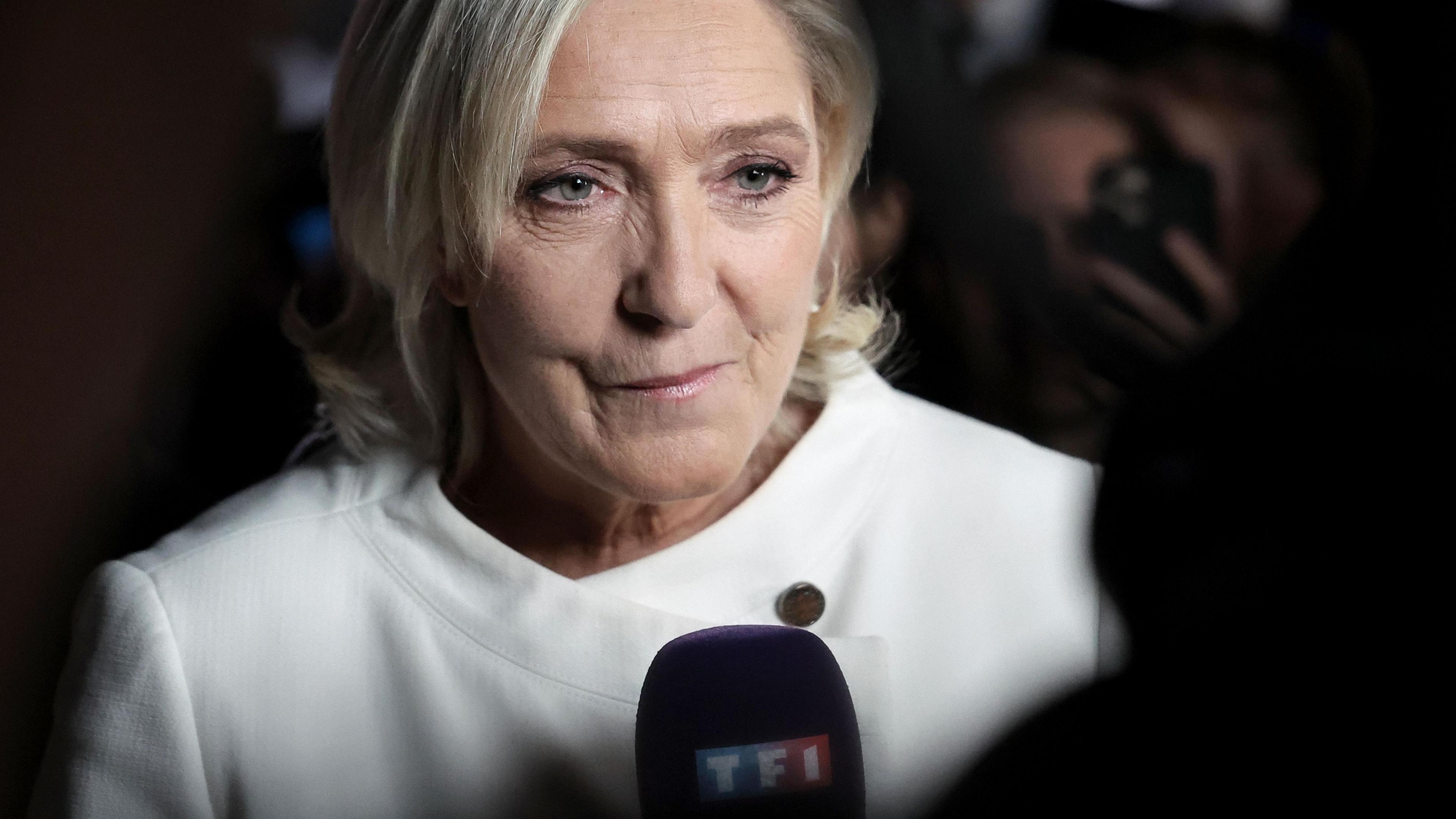 Marine Le Pen addresses journalists after the second round of voting.