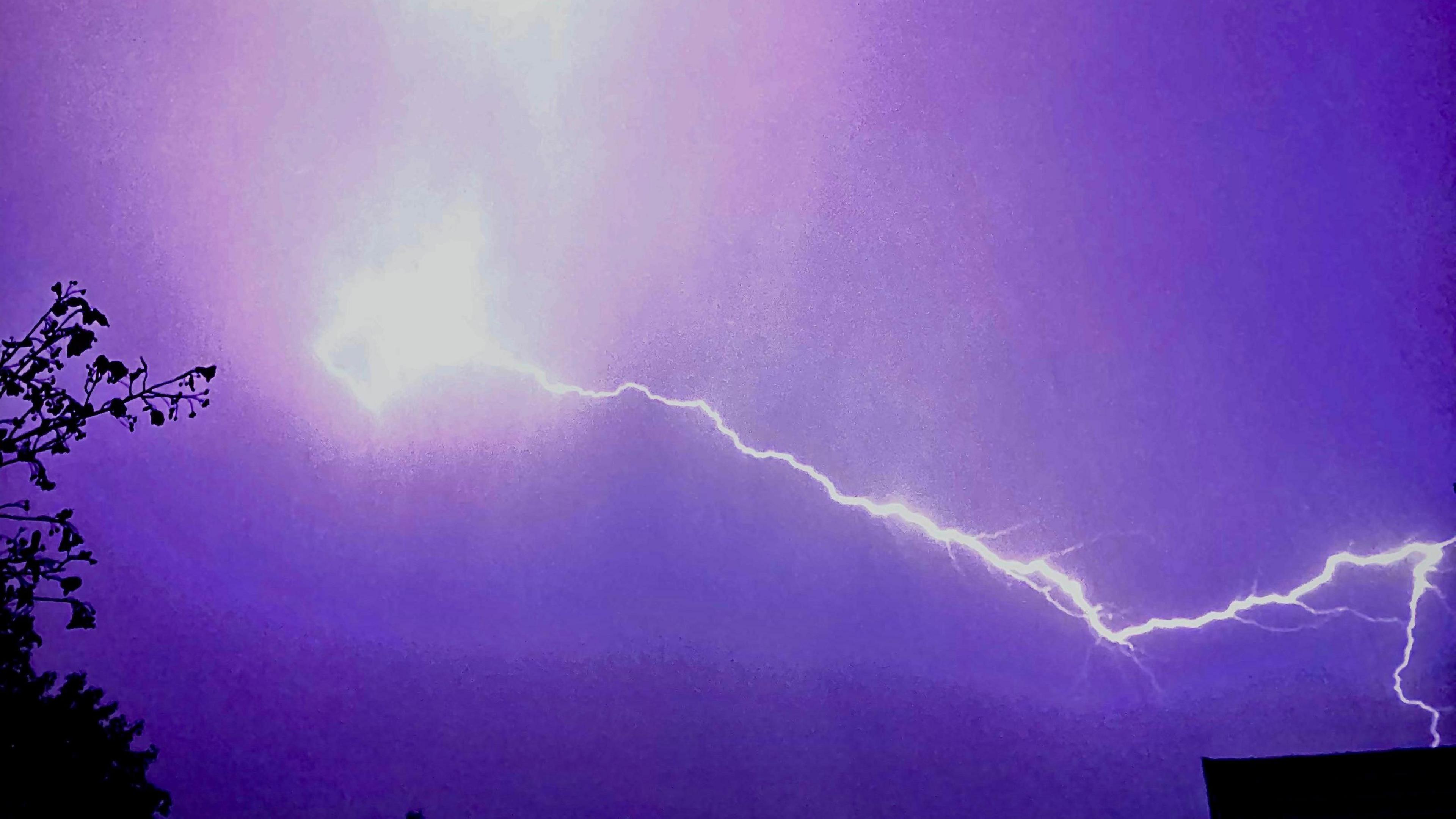 Lightning strike on a purple sky 