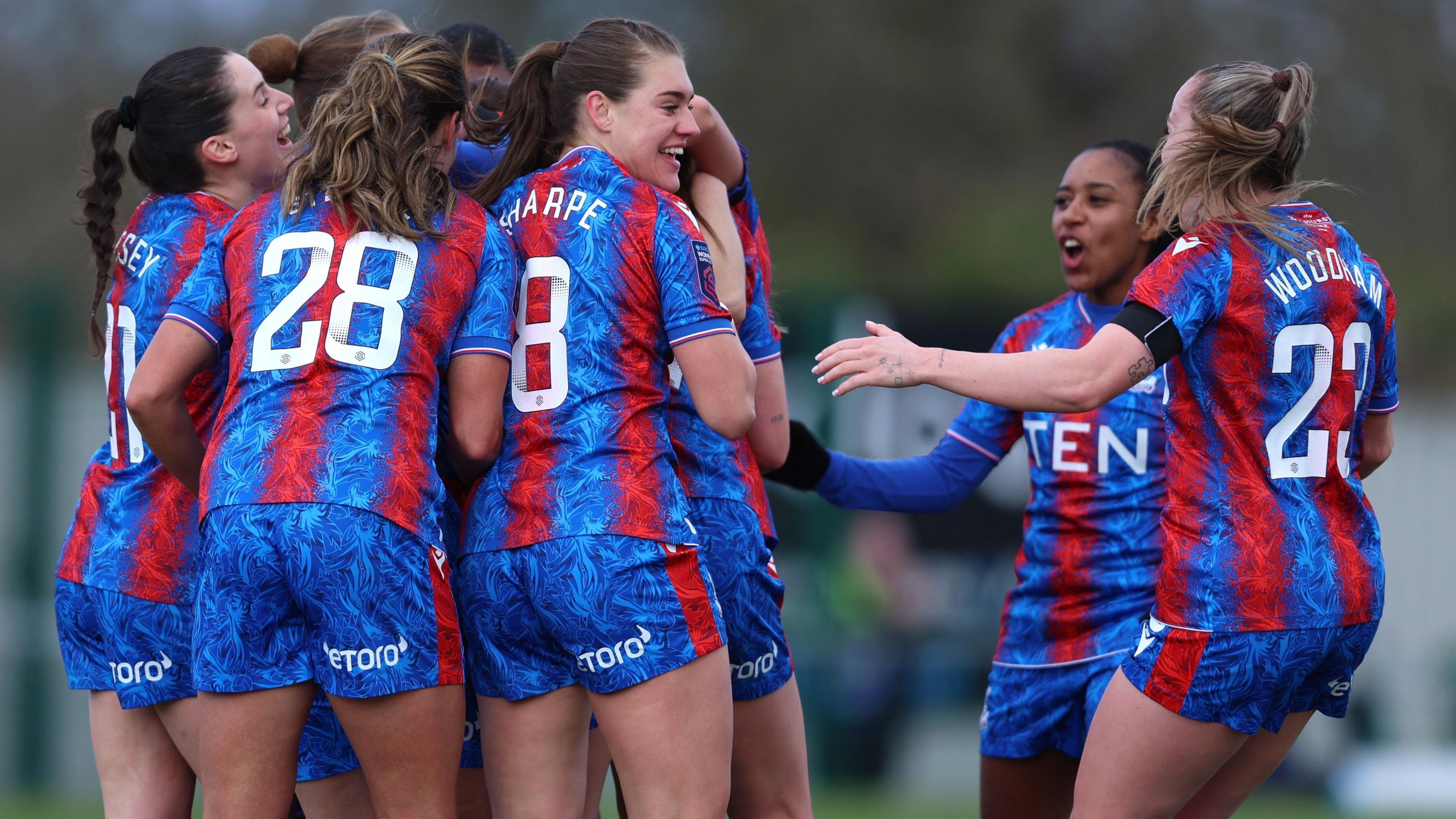 Aniek Nouwen of Crystal Palace celebrates scoring with team-mates against Aston Villa