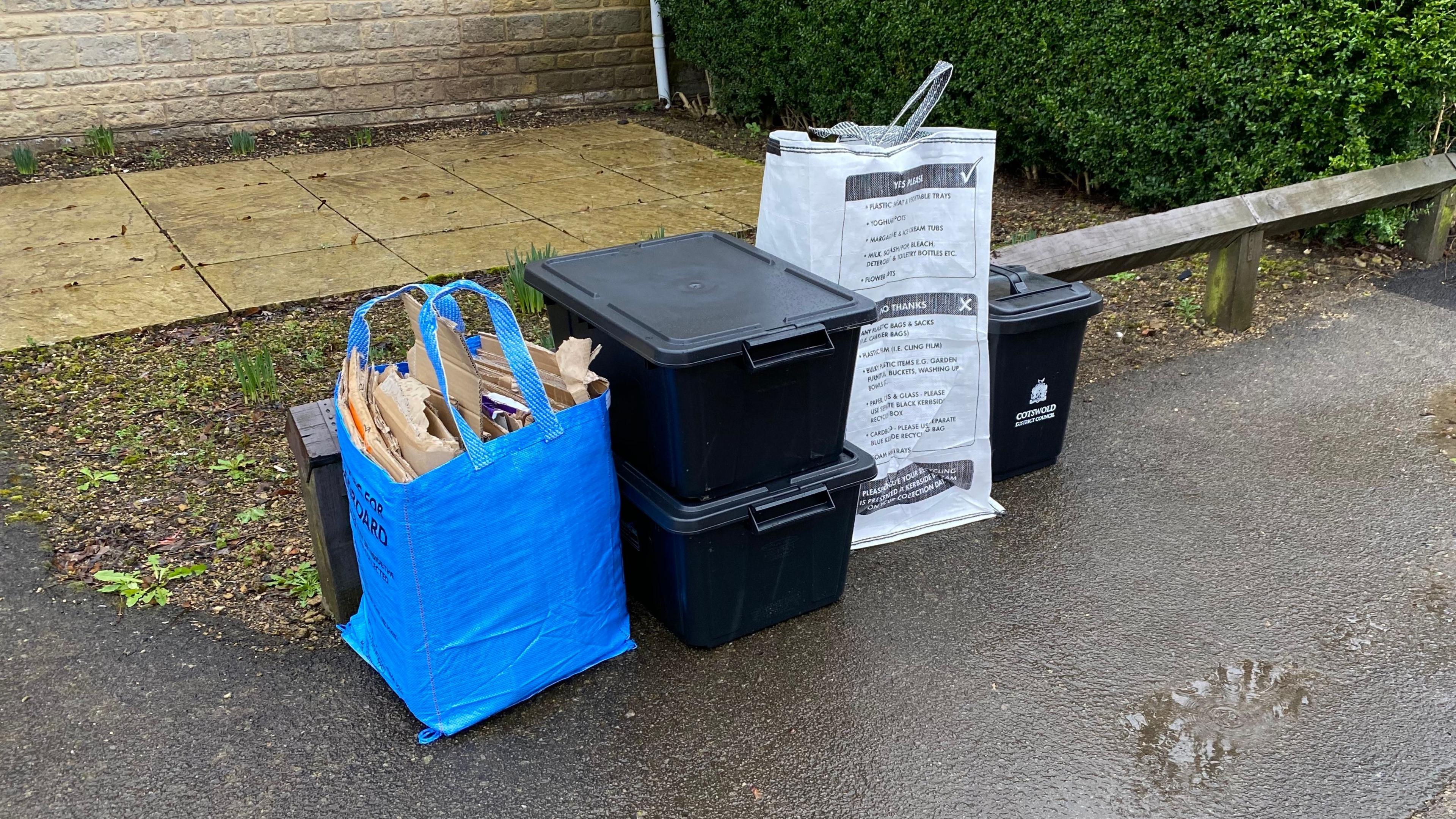 A selection of recycling outside on the street