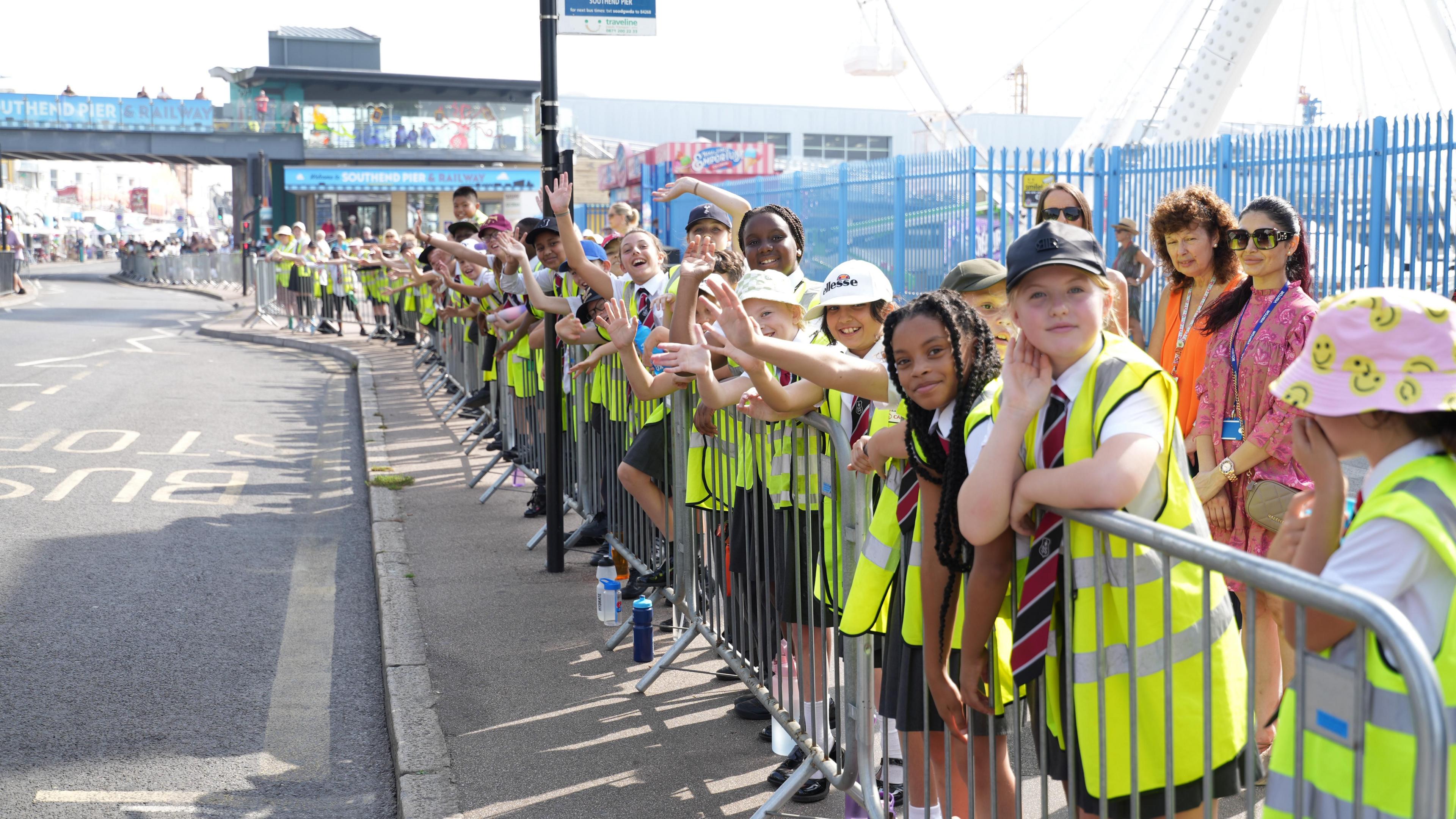 School chlildren ready to watch the Tour of Britain