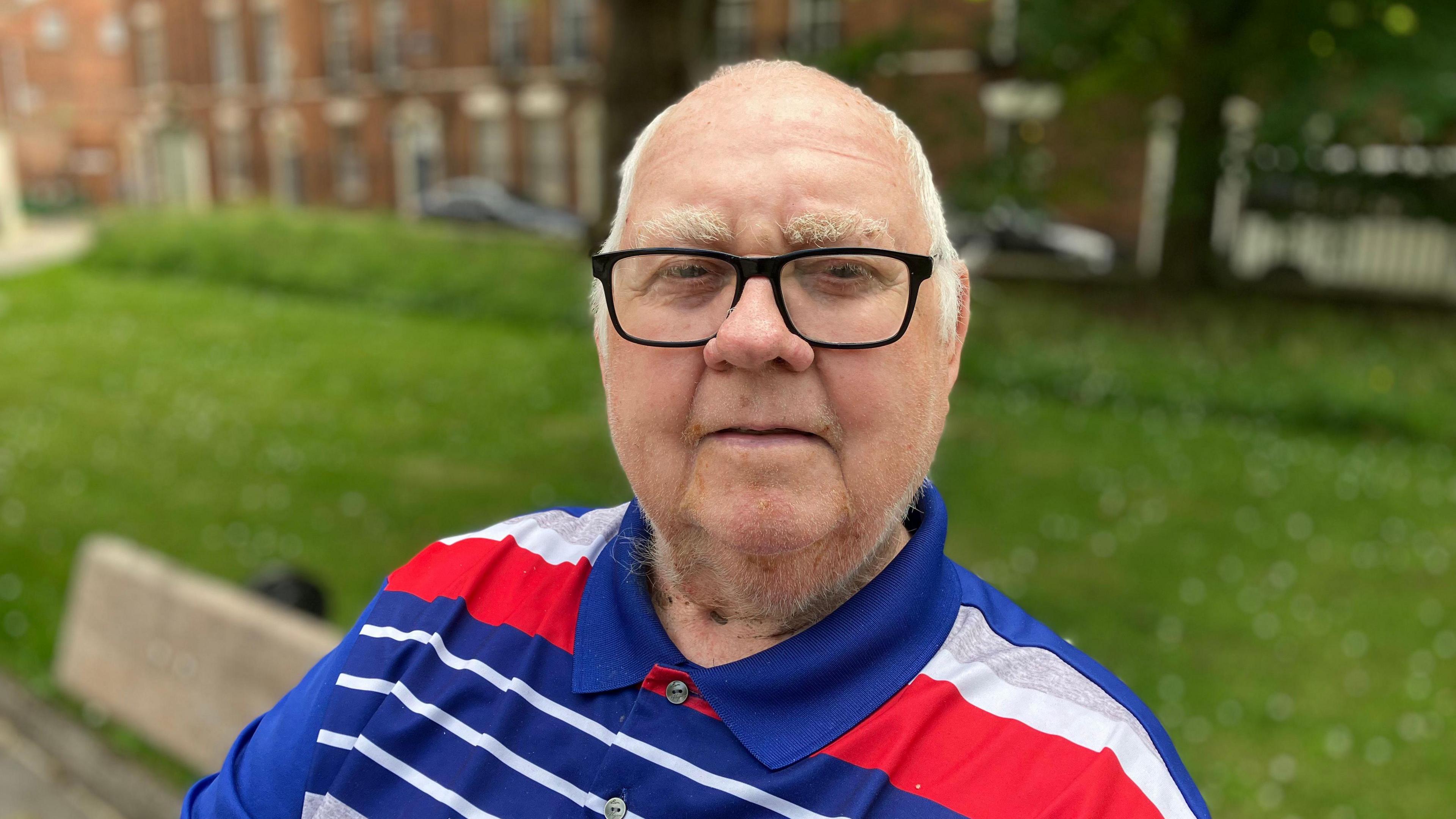 a man sitting on a bench