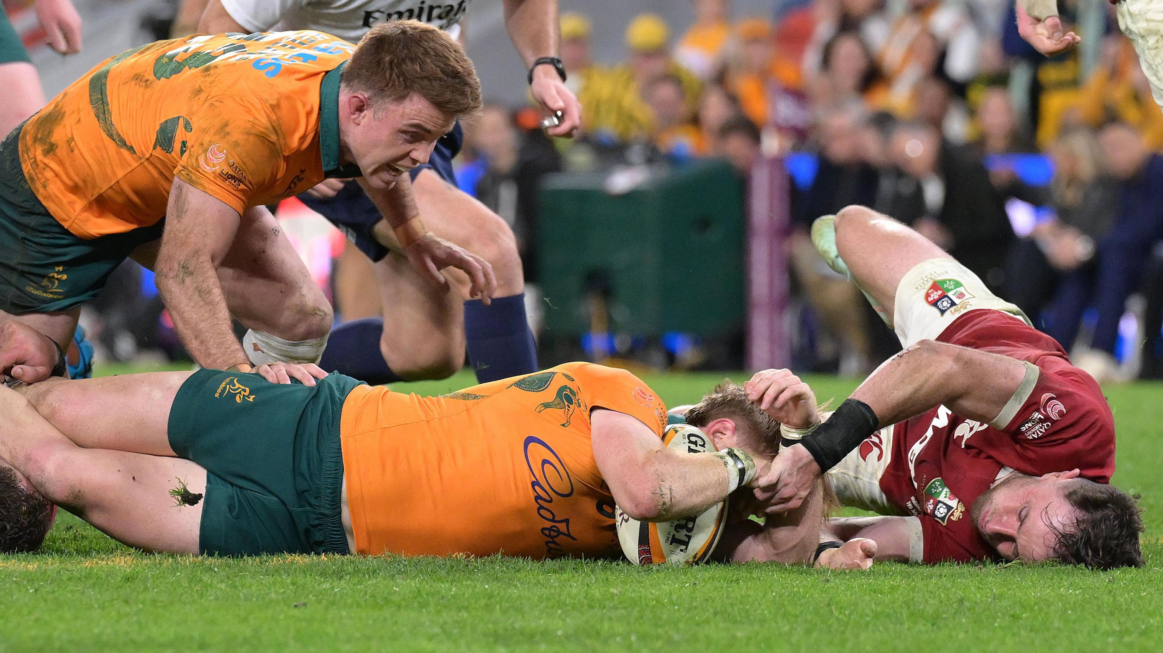 Australia score a try against the Lions in Brisbane