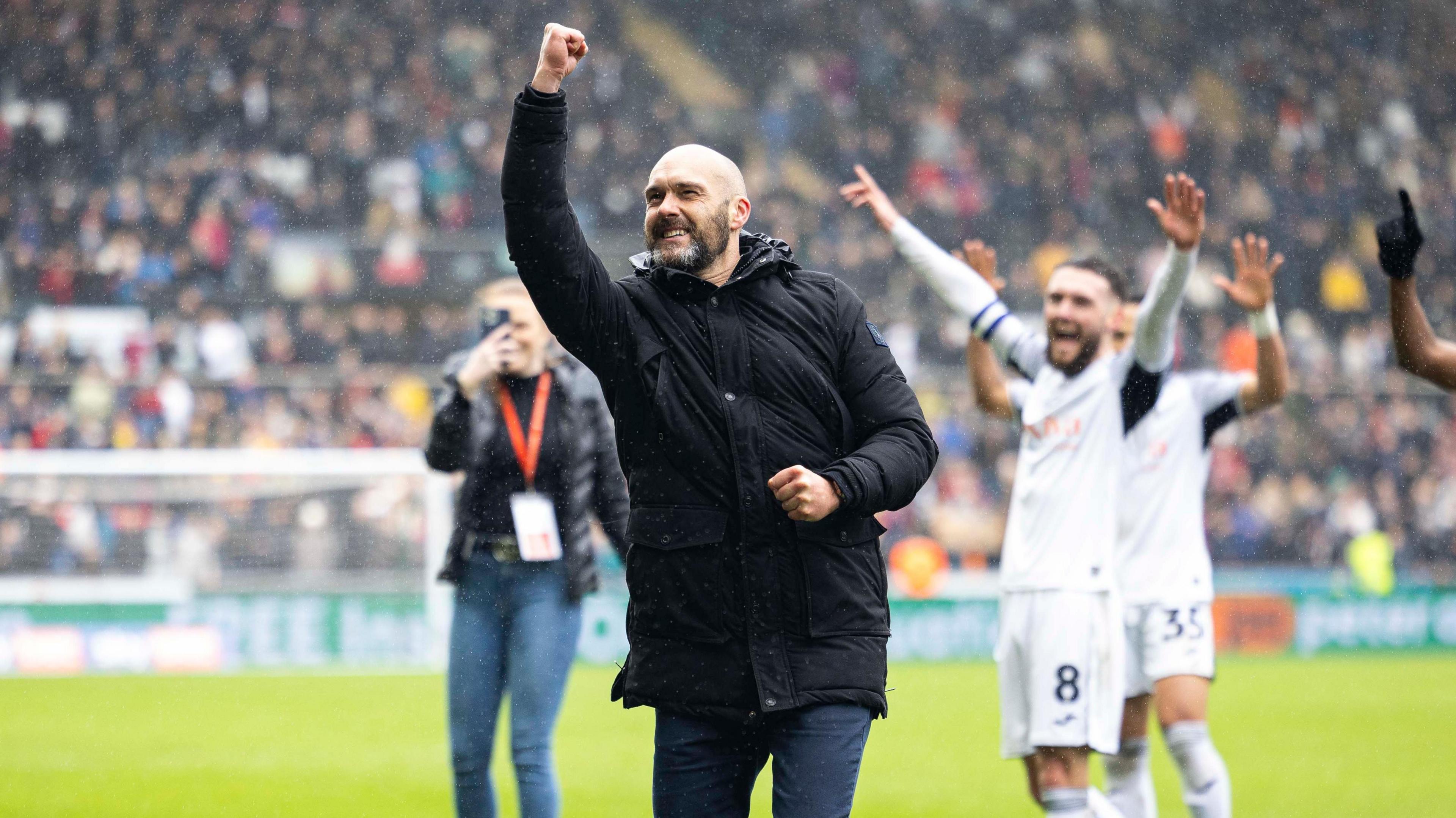 Luke Williams celebrates a Swansea triumph   