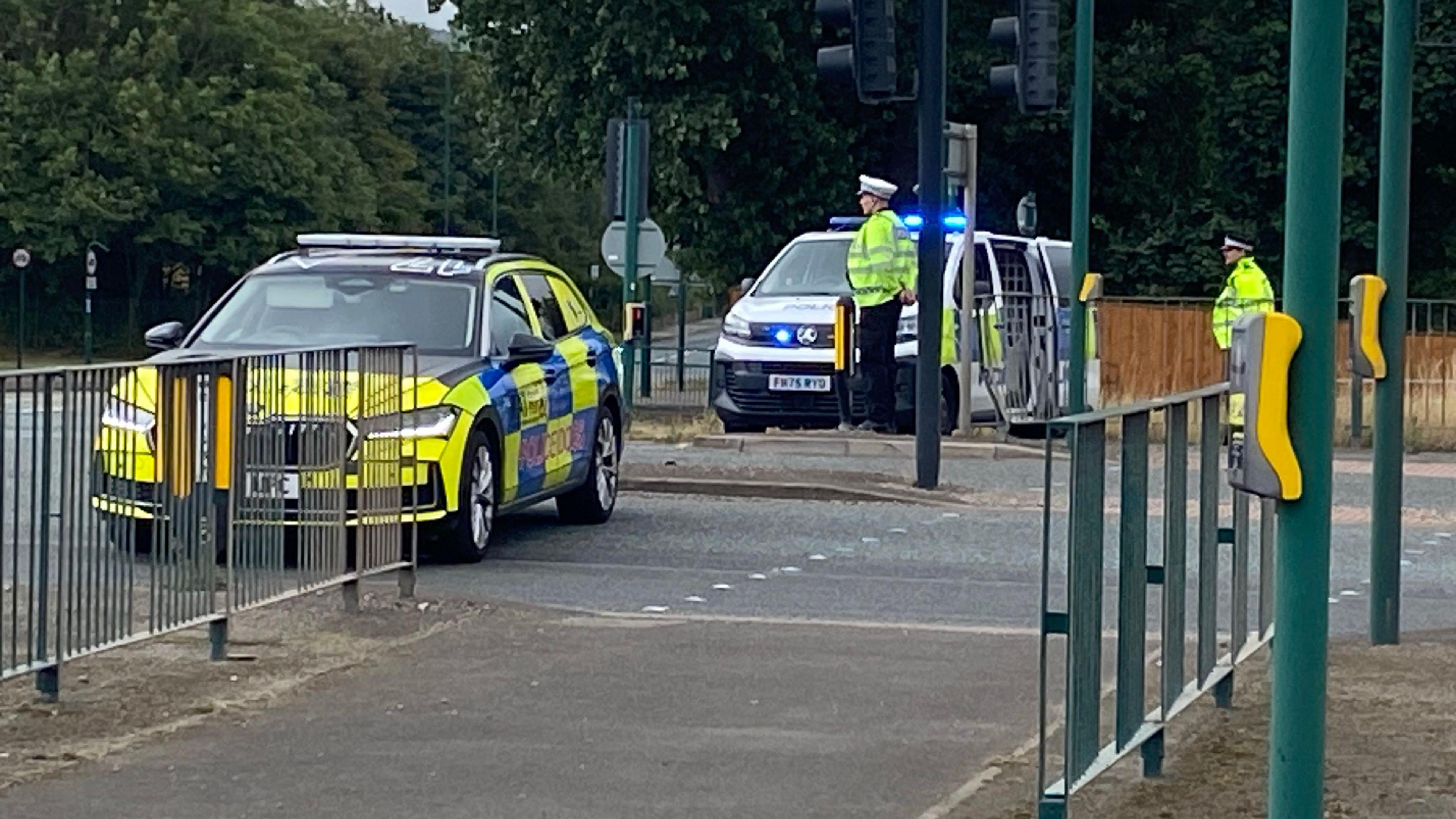 Another angle of the previous photo, taken from a nearby pedestrian crossing behind the road blockade.