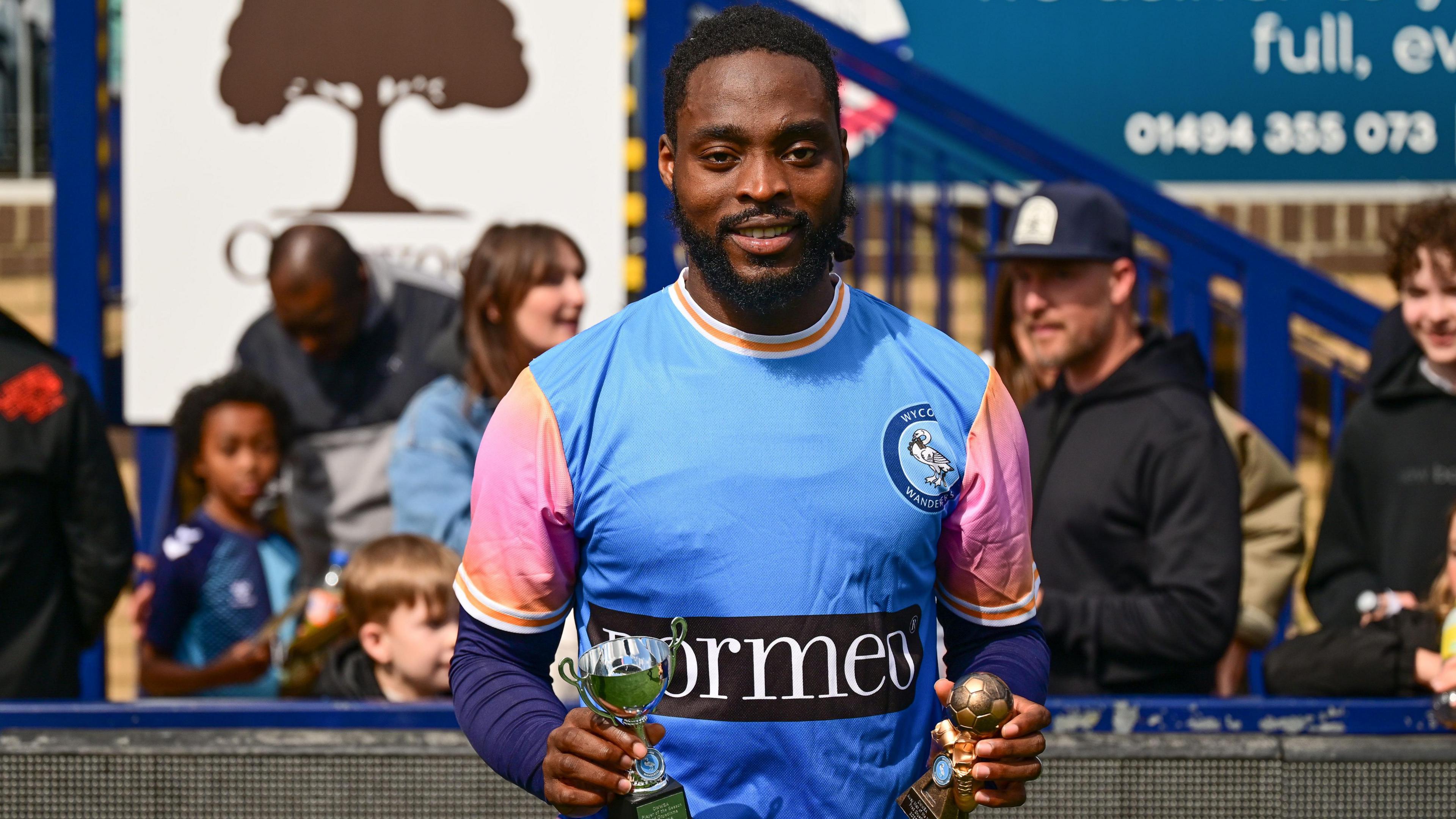 Fred Onyedinma with the Wycombe Supporters' and Players' player of the season awards